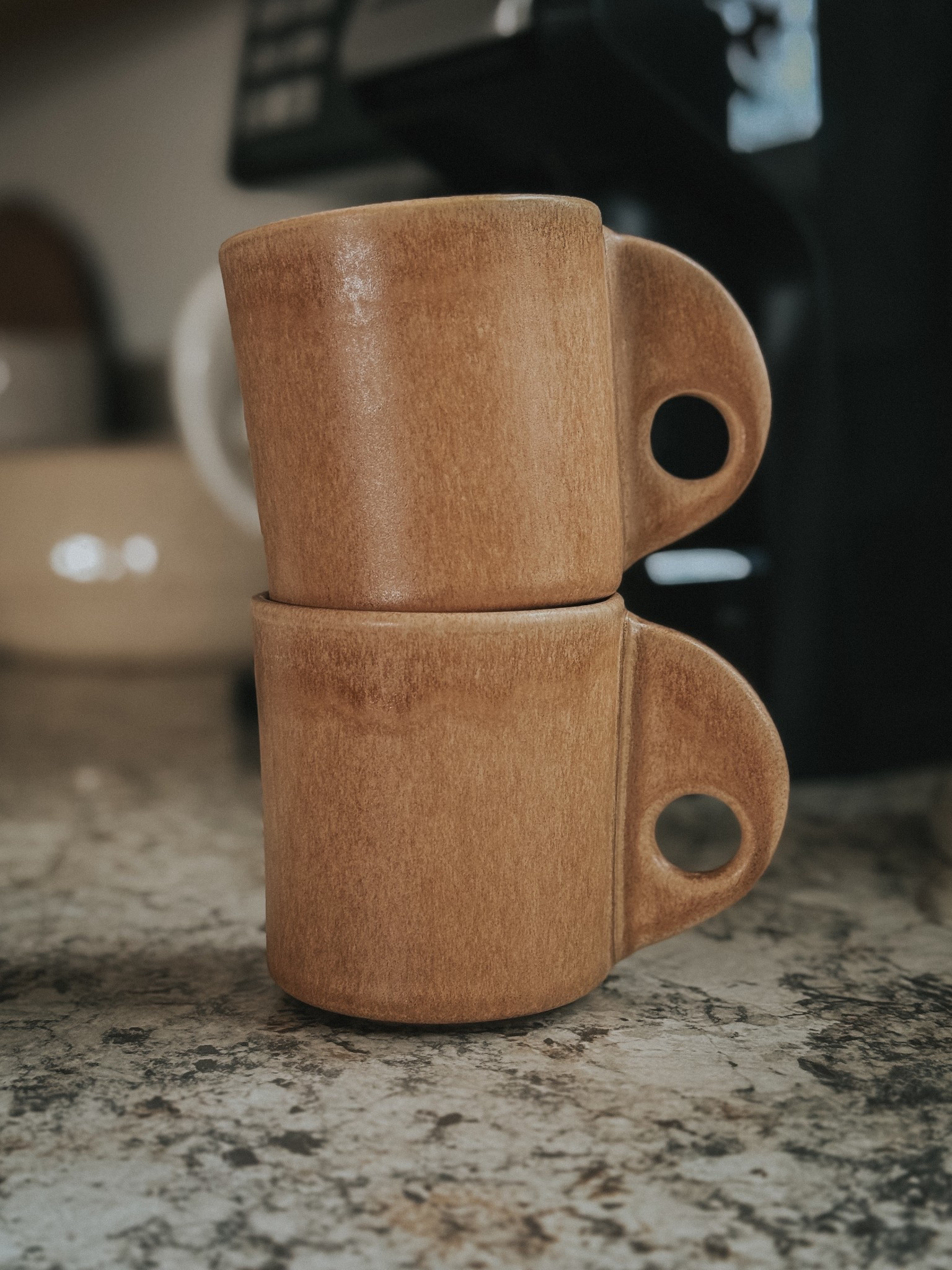 Neutral stoneware mugs. Love how unique the handle is! Surprisingly, they are easy to hold. So fun! On sale right now as well. H&m home  

#LTKSeasonal #LTKHome