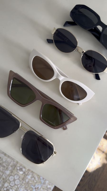 My sunglasses lineup: Prada in black square, Celine dupe from Amazon, YSL cat eye in ivory, Le Spec retro in dark beige, and my go to aviator metal style from Amazon! 

#LTKfindsunder100 #LTKstyletip #LTKSeasonal