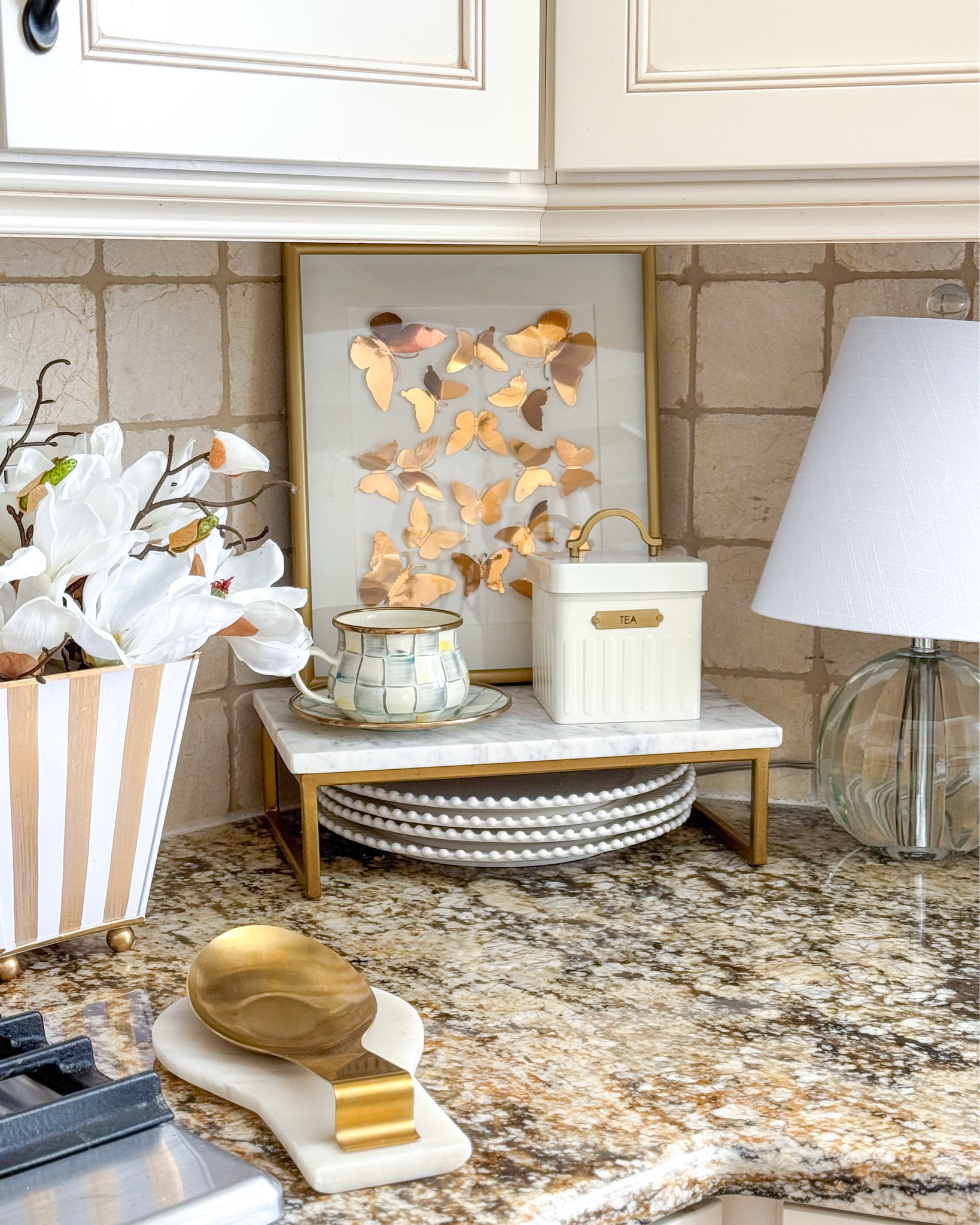Designer Look for Less! Make your own DIY 3D art with this butterfly kit from Amazon and an affordable deep profile frame! I used the 8x10 frame linked.

DIY Art, gold butterflies, gold decor, glam decor, spring decor, designer dupe, tea canister, kitchen canisters, target finds, kitchen organization, tea cup, Mackenzie Childs, sterling check, white plates, crystal lamp, magnolia stems, spoon rest

#LTKFindsUnder50 #LTKHome #LTKSeasonal