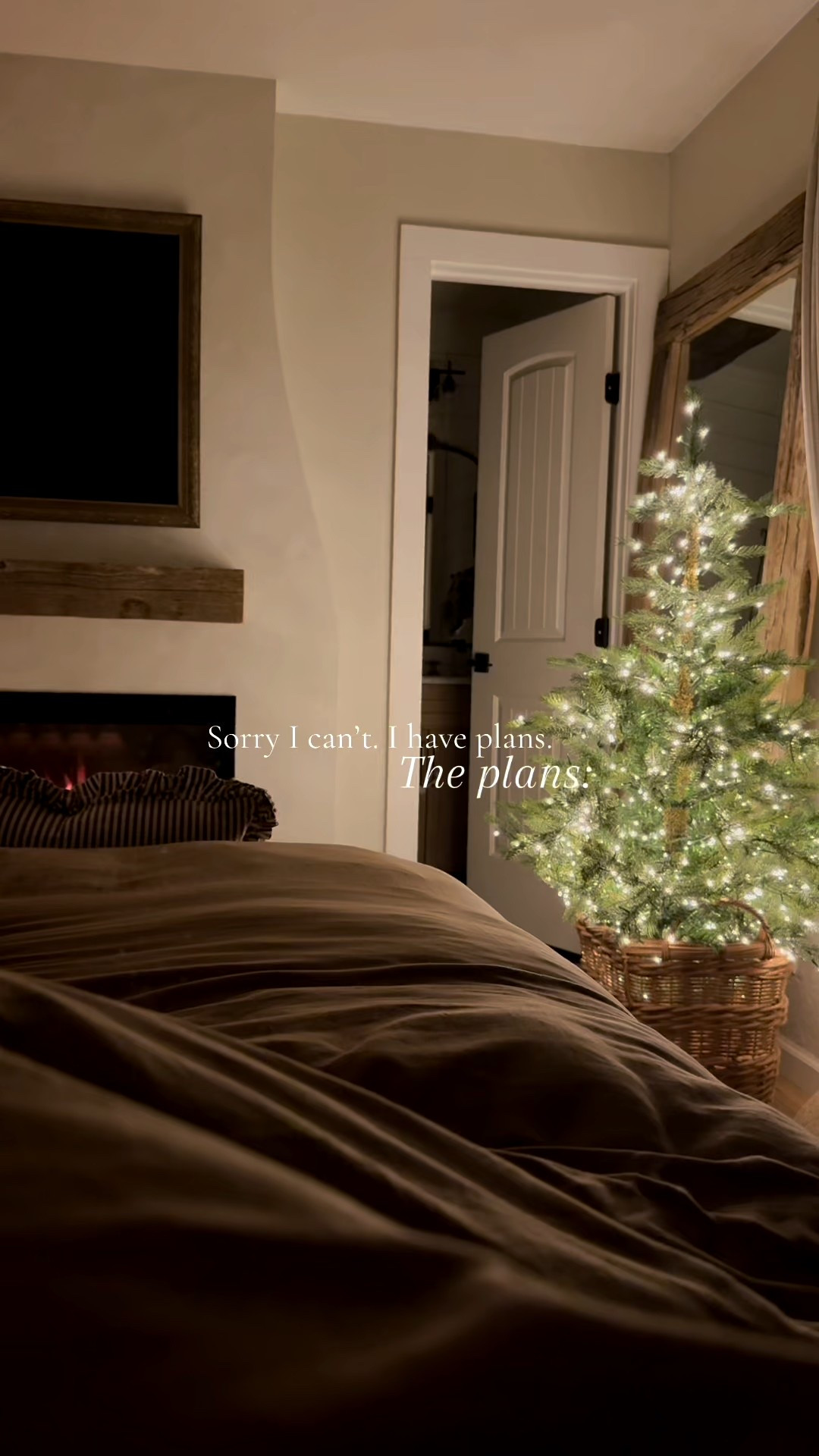 Cozy bedroom evening at home. Catch me by the candle light and Christmas tree glow. This is my favorite realistic electric fireplace too  

#LTKCyberWeek #LTKHoliday #LTKHome