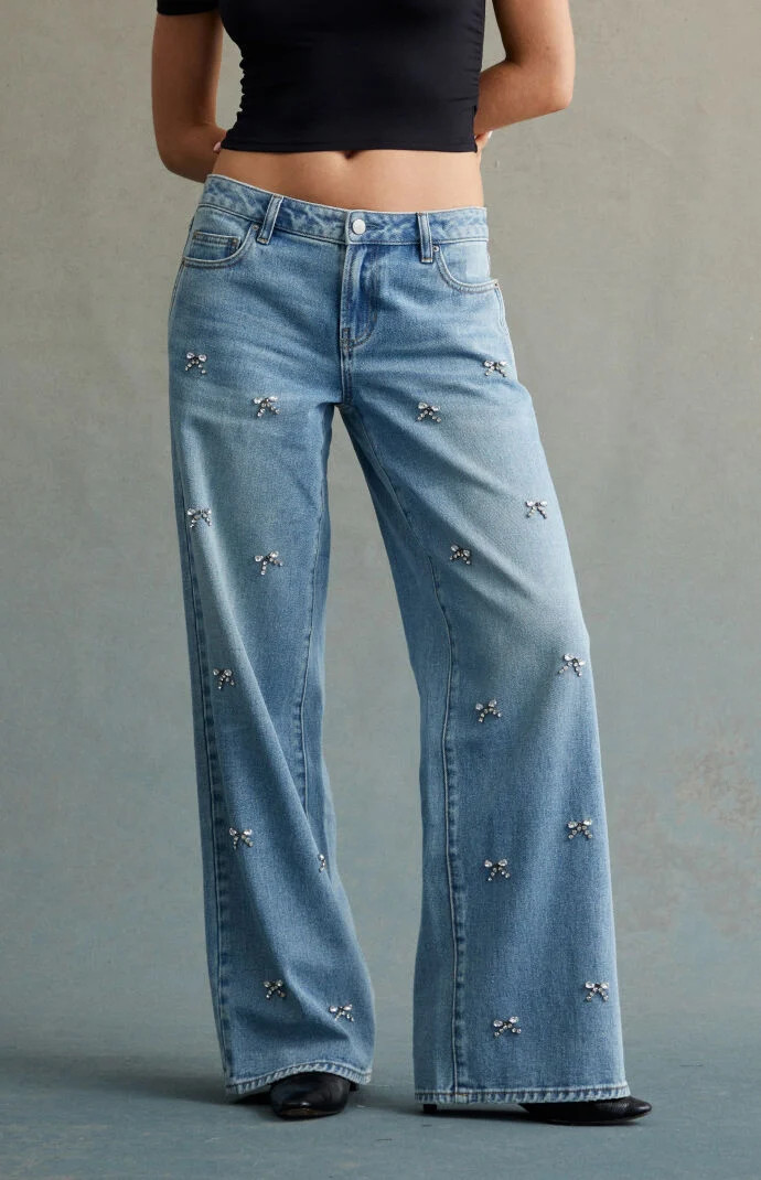 RARE DNM EDIT Women's Light Indigo Rhinestone Bow Low Rise Baggy Jeans in Medium Indigo - Size 32 | PacSun