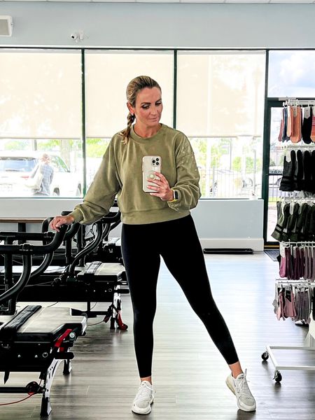 My favorite Pilates/post Pilates outfit!  Best leggings for compression and love this butter soft sweatshirt for before and after. #workoutstyle #workoutwear #athleisure 

#LTKover40 #LTKfitness #LTKfindsunder100