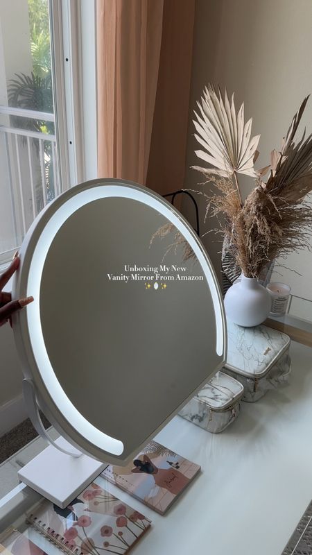 Under $100 gorgeous round led vanity mirror with 360 rotation on amazon 

#LTKbeauty #LTKhome #LTKunder100