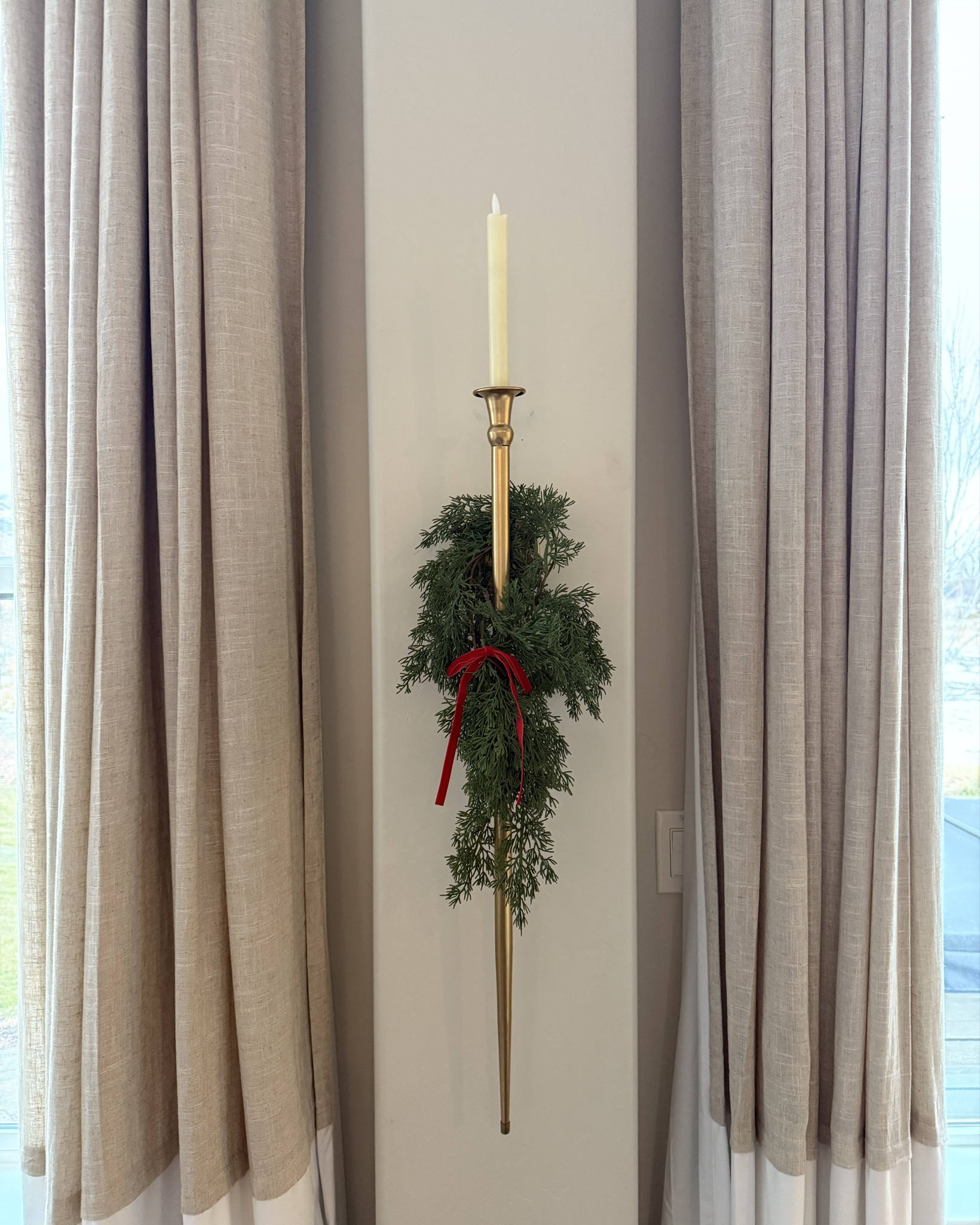 Shop my Amazon candle sconce. Also comes in black! I cut a piece of this garland to make it Christmas ready.

#LTKFindsUnder50 #LTKHoliday #LTKHome