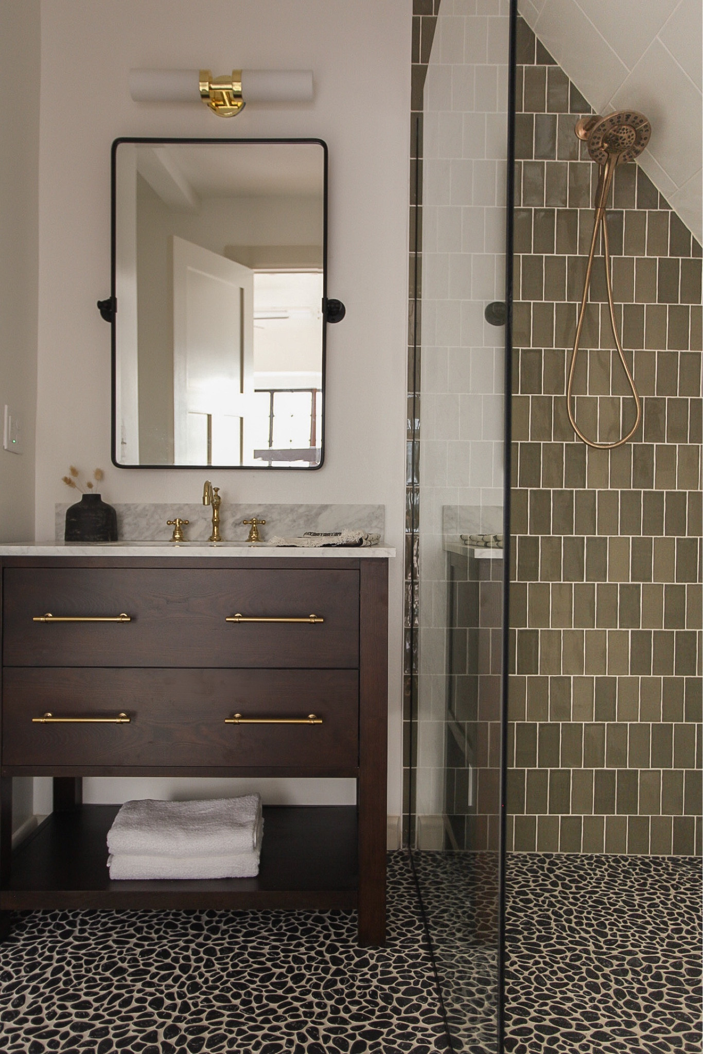 The primary bathroom from the Pennsylvania Project (fun fact…this space used to be a closet) and all the fun details are linked. We especially love this richly stained vanity with brass accents. Check all the details! #bathroom 

#LTKhome