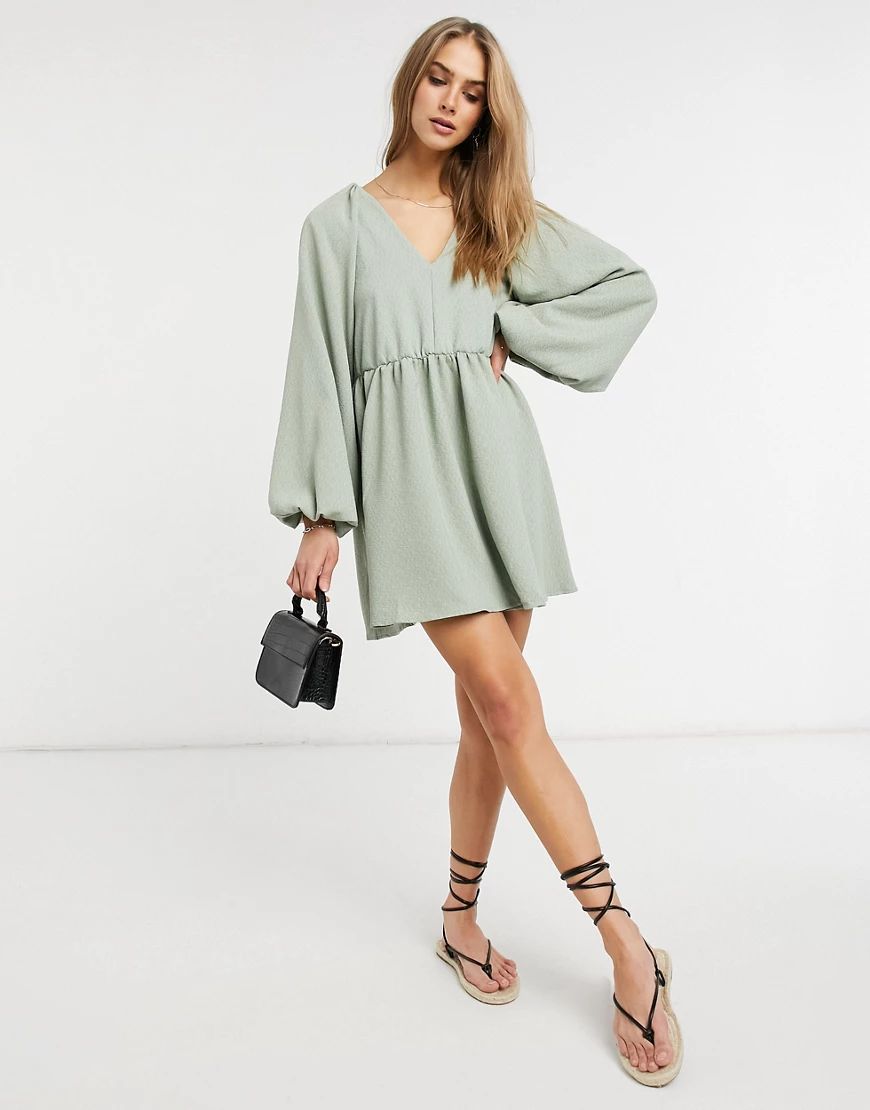 ASOS DESIGN textured mini smock dress with volume sleeves in sage green | ASOS (Global)