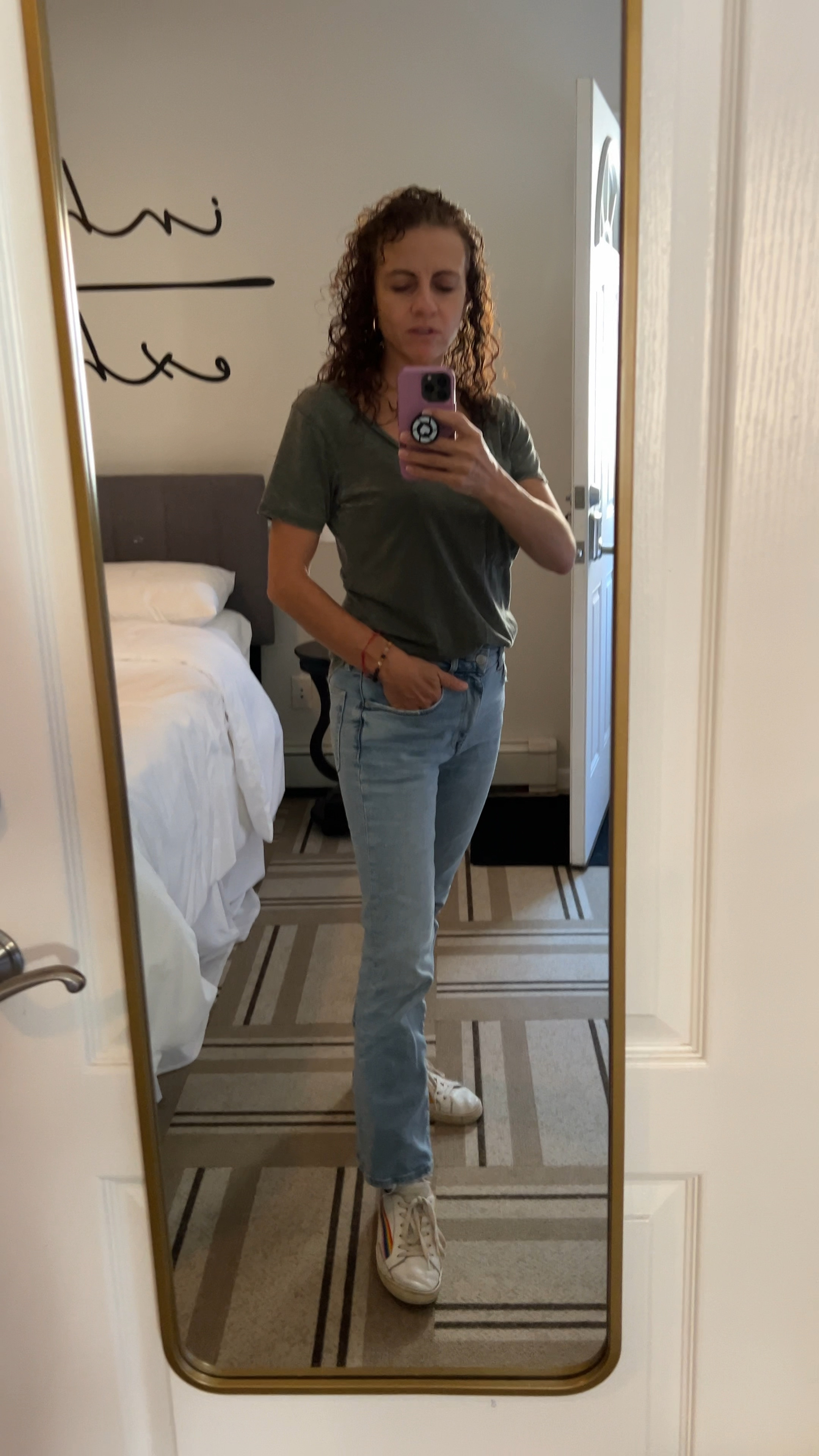 Fall fashion look for today. Olive t shirt with light wash jeans and solids good vibes rainbow sneakers. Paired with gold jewelry. Timeless fashion.  Gold mirror is perfect for checking yourself  

#LTKVideo #LTKSeasonal #LTKStyleTip