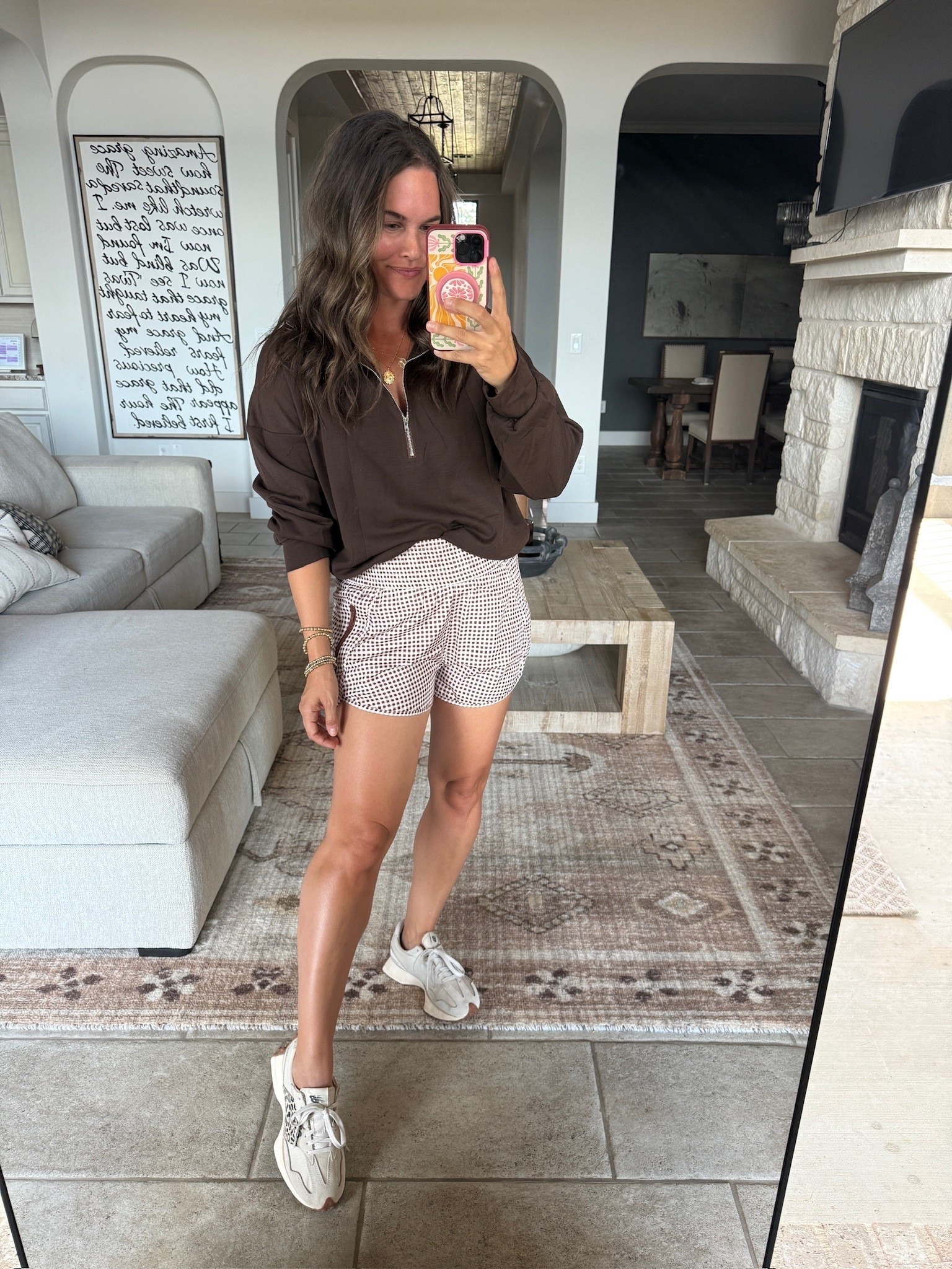 This is my kind of fall outfit when it’s still 80 degrees outside. Plaid shorts + a chocolate brown half zip just work.

fall outfit, warm fall outfit, plaid shorts, chocolate brown pullover, half zip sweatshirt, casual fall outfit, fall athleisure, neutral sneakers, mom on the go outfit, transitional fall style, everyday fall outfit, JulieFranks