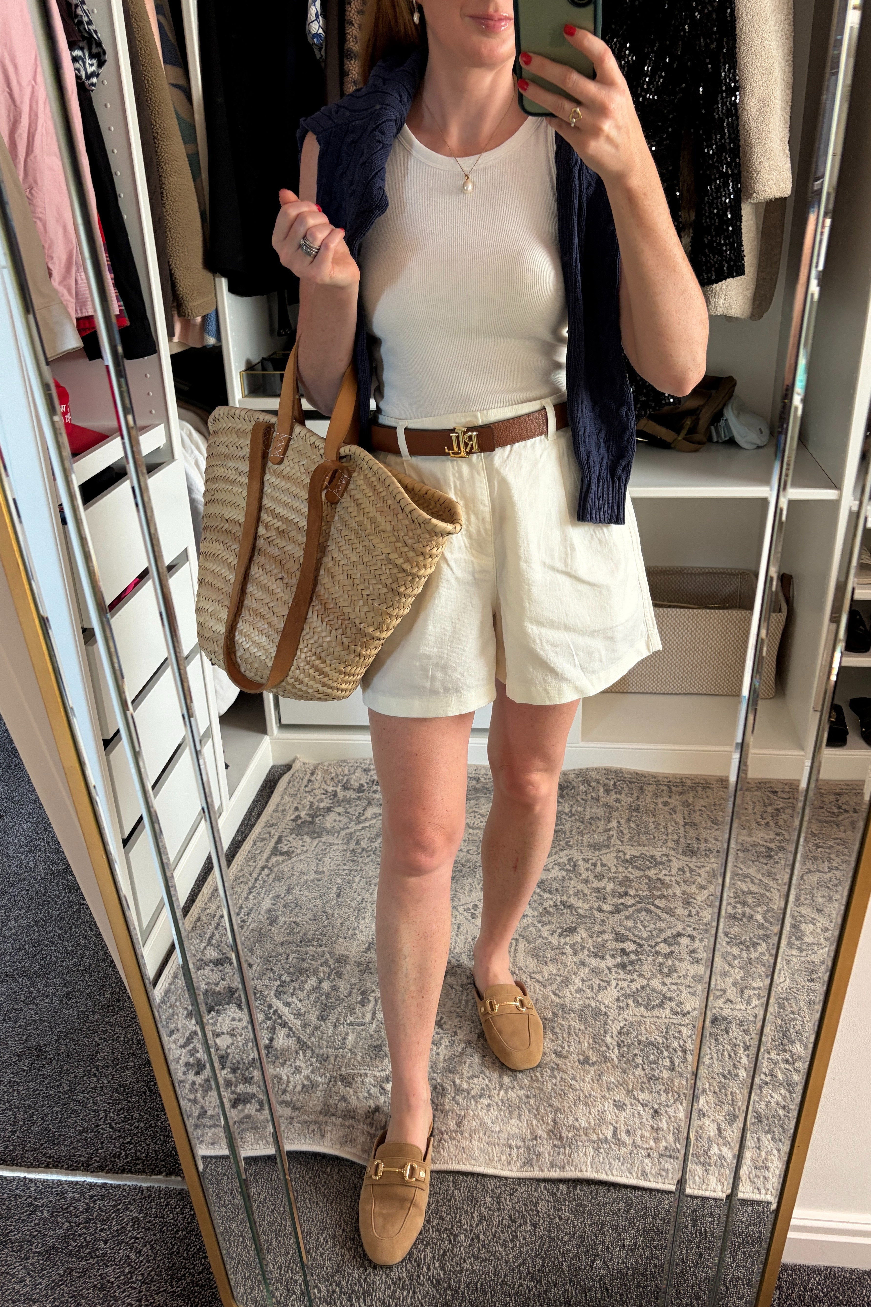 Same Uniqlo white vest and shorts, styled three ways 🤍 For this look, I added a navy cable knit sweater, woven market tote, tan belt and slip on loafers. The perfect mix of relaxed, polished and effortlessly put together. 💙 white shorts, tan belt, tan bag, summer outfits over 40 

 #LTKuk #LTKsummer #LTKtravel