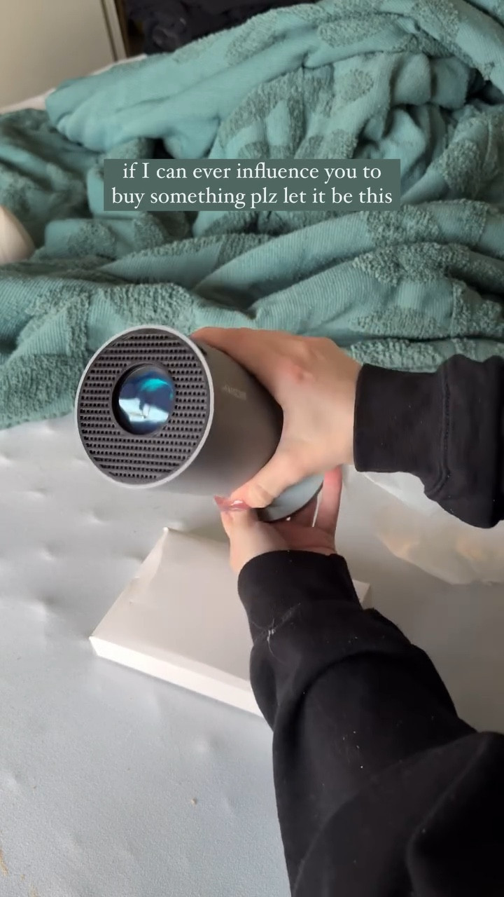 no screens or tv in our bedroom since we moved has been one of the best decisions for my mental health and sleep hygiene. less blue light, less stimulation, more rest ☁️ 

but sometimes I just wanna curl up and watch a movie in bed w/o disrupting the whole vibe. so I caved (kinda) and got this 4K smart projector 📽️ it tucks away easily when I’m done—unlike a bulky tv—and still keeps my bedroom feeling like a restful retreat! 
#amazonhomefinds #smartprojector #amazonfinds #movienight #amazonfinds #sleephygiene #bedtimeroutine #amazonmusthave #unboxingasmr

#LTKFindsUnder100 #LTKSaleAlert #LTKHome