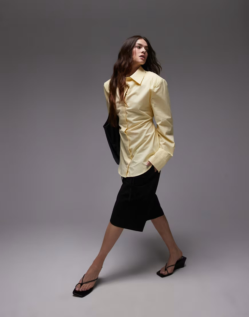 ASOS DESIGN cinch shoulder pad shirt with tie back in buttermilk-Yellow | ASOS (Global)