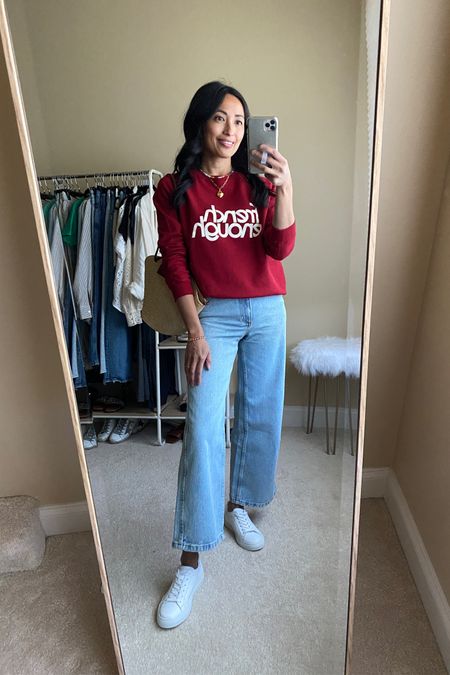 Jeans. Spring outfit. Graphic sweatshirt. Tops true to size. Jeans size up. Tote bag also from @sezane  White sneakers. 

#LTKStyleTip #LTKItBag #LTKOver40