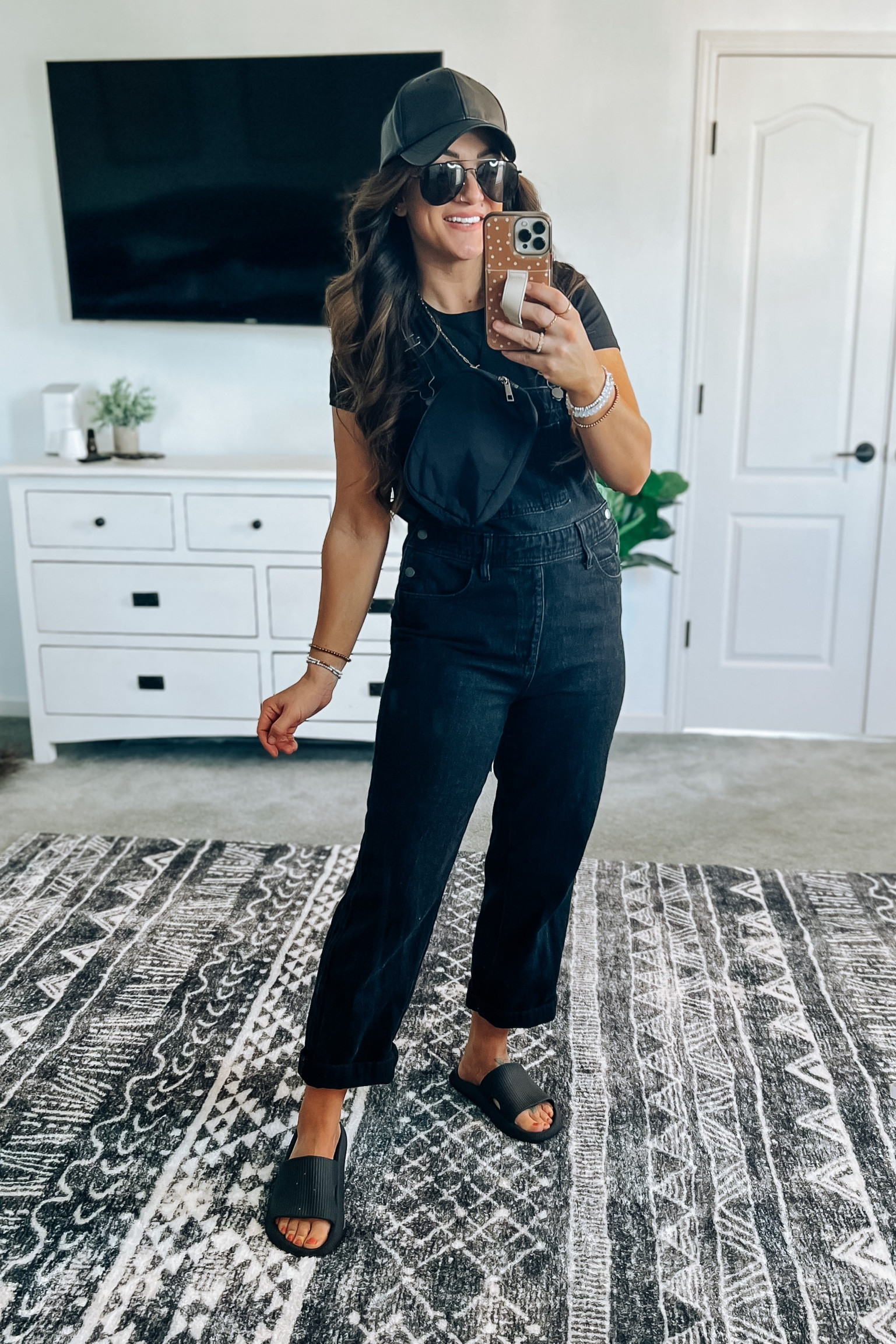 All black outfit 
Monochromatic look
Bib overalls on clearance! In my true size but cuffed the bottoms 
My pillow slides are also on sale! TTS 

#LTKsalealert #LTKstyletip #LTKunder50