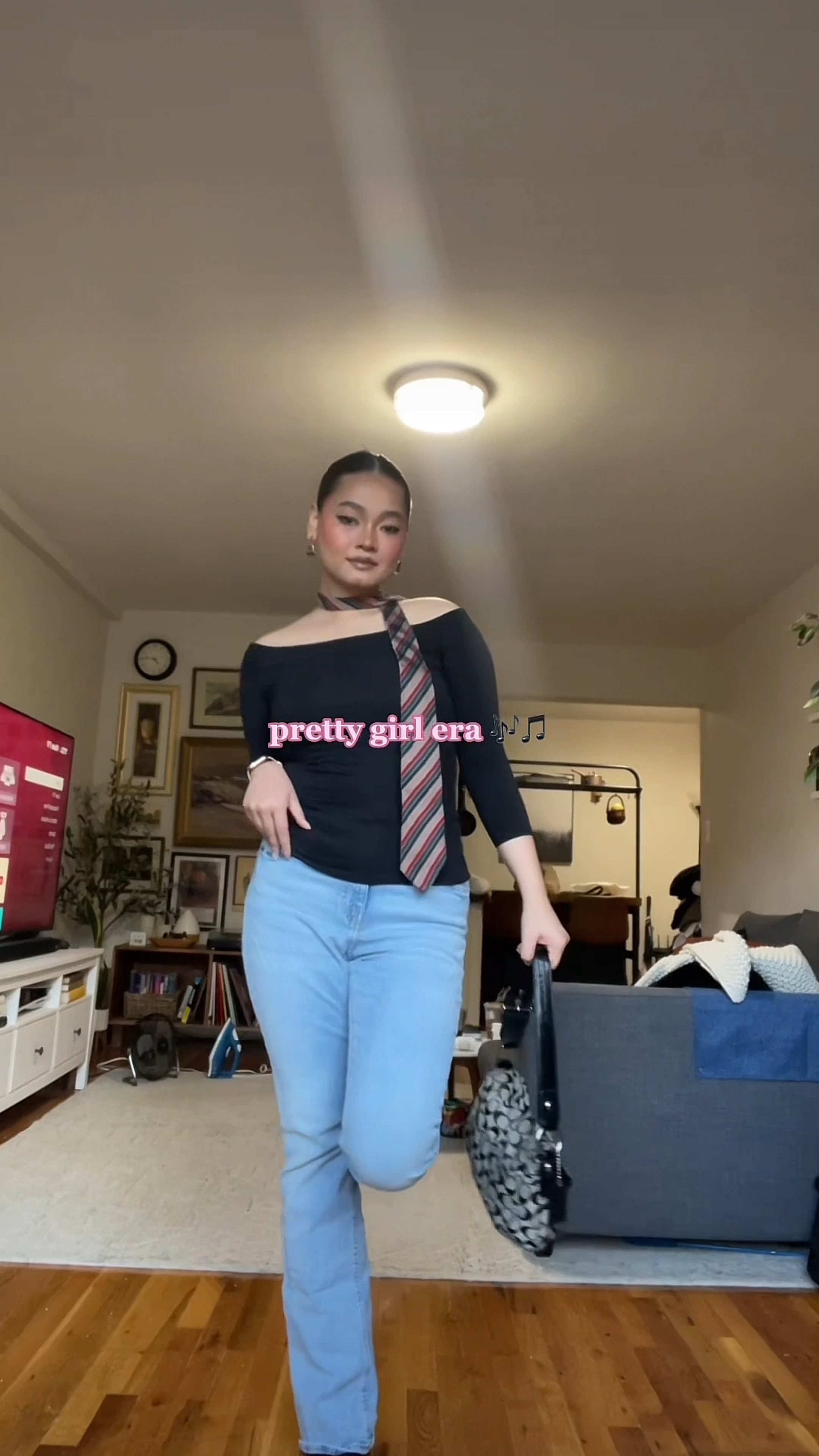 Necktie as scarf 🫡 in my y2k era 💗 love my black off shoulder paired with bell bottom jeans. Also ive been obsessing over necktie recently 💗

#LTKFind #LTKSeasonal #LTKGiftGuide