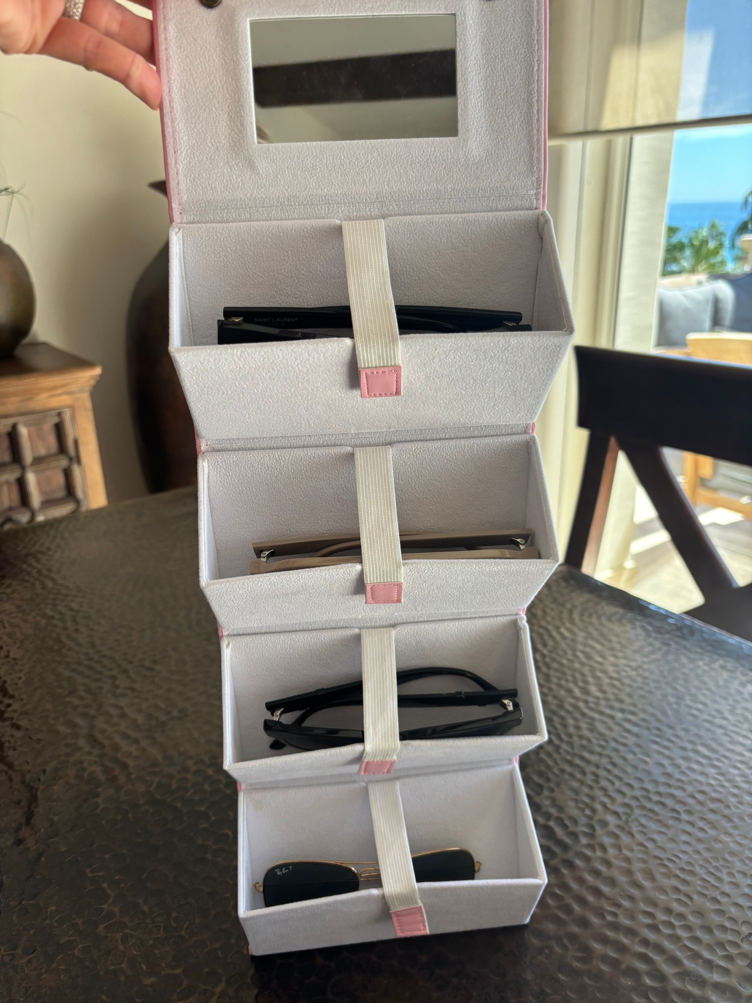 Foldable sunglasses holder that holds 4 pair of sunglasses!

#travel #traveltips #packingtips #beachvacation #sunglassescases #sunglasses #beachwear #outfitsbeachvacation #amazon 