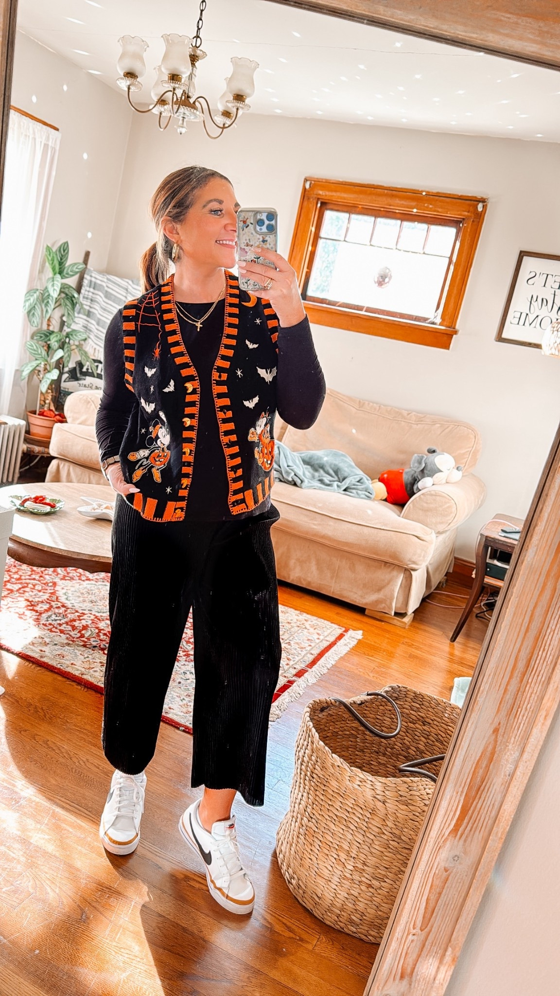 Mixing Disney magic with fall layering 🍂✨ The cutest Halloween vest find + classic Nike sneakers for comfy-cute days. All linked on LTK! #LTKStyle #FallOOTD #DisneyStyle 