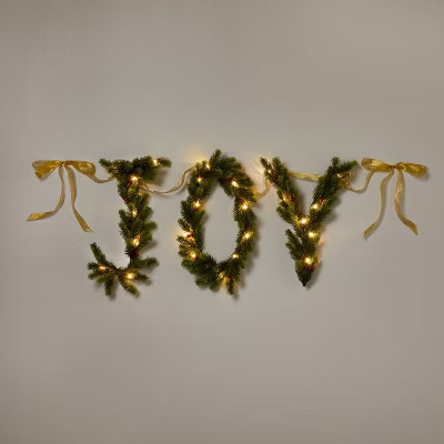 6' Pre-Lit Battery Operated Mixed Greenery 'Joy' Garland with Gold Ribbon - Wondersho... | Target