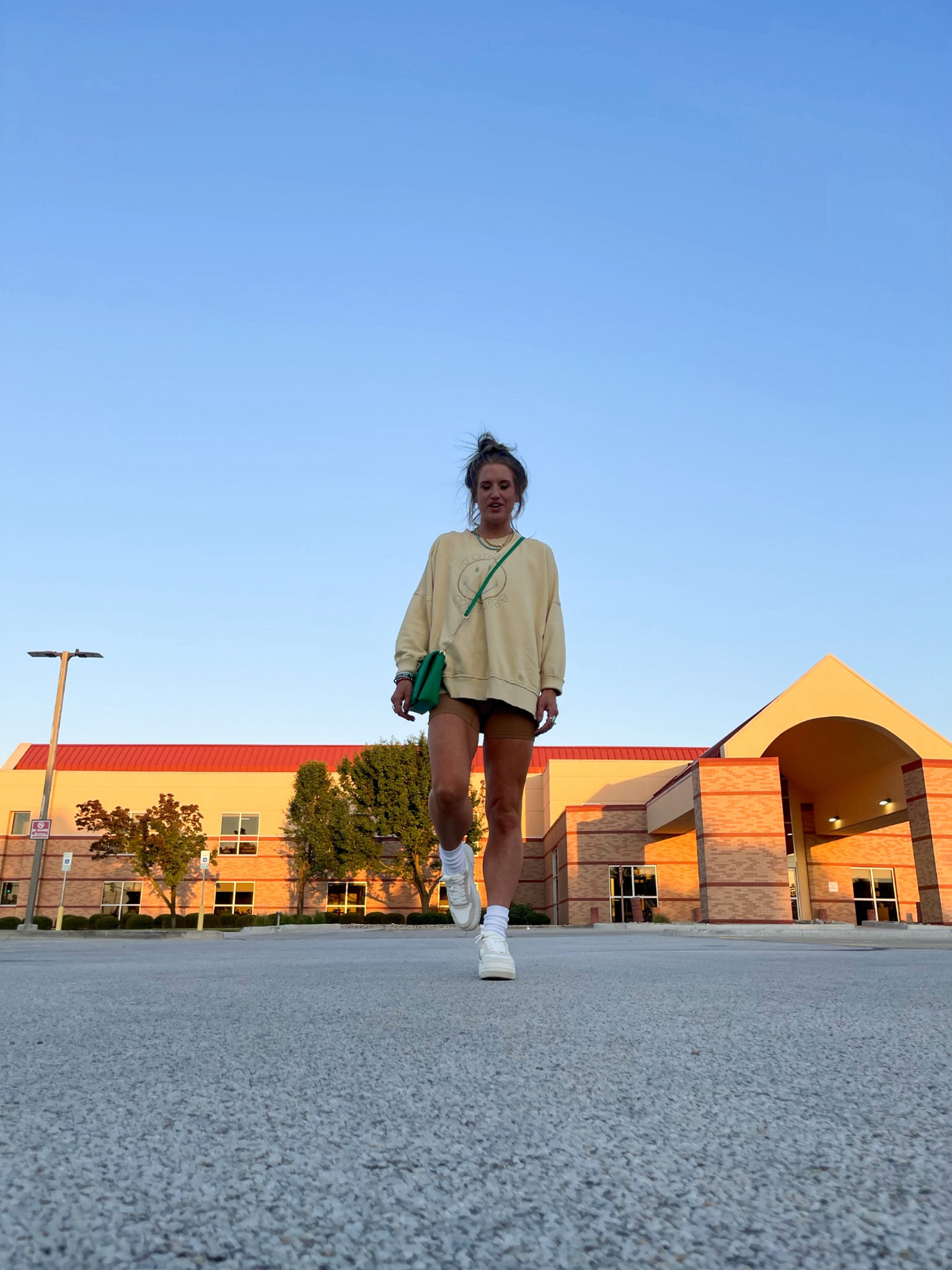Casual warm weather Fall OOTD | dinner night with the kids | Aerie oversized crewneck | Target bike shorts and purse | Zara shoes | A&E socks | Amazon jewelry 

#oversized #scrunchsocks #targetfinds #ootd #fallstyle  

#LTKsalealert #LTKstyletip #LTKfindsunder50