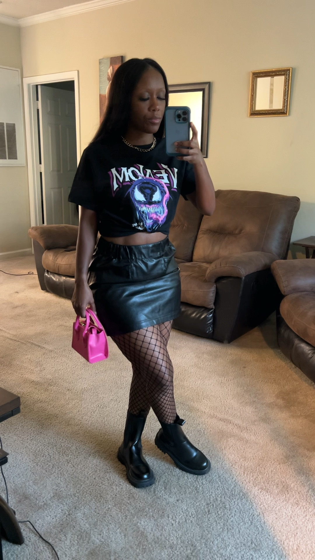 Boot outfit!

I’m wearing a black graphic tee with a black faux leather skirt and fishnet stockings.

I styled this look with a pink mini crossbody purse and black zip back Chelsea boots.

#LTKFindsUnder100 #LTKFindsUnder50 #LTKStyleTip