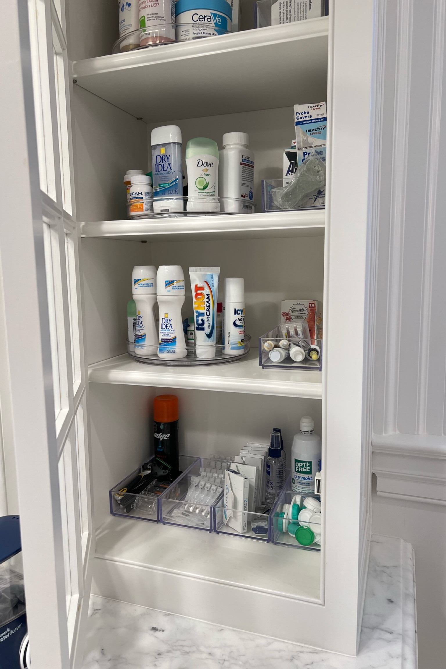 Coming in a variety of sizes, these Idesign acrylic trays are a great sleek way to contain medicine cabinet necessities and toiletries. We also added acrylic lazy susans to make it easy to view, reach and grab what you need.

#LTKfamily #LTKmens #LTKhome