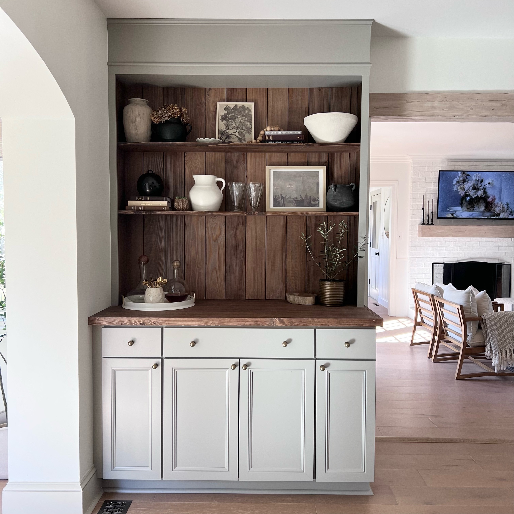 Kitchen Hutch | Kitchen Built Ins | coffee bar | kitchen bar | drawer pulls | cabinet hardware | vintage art | decanter | bar decor | tray | pitcher | cabinets | vintage glassware | stemware | etched glass cups | olive tree plant 

#LTKunder50 #LTKhome #LTKunder100