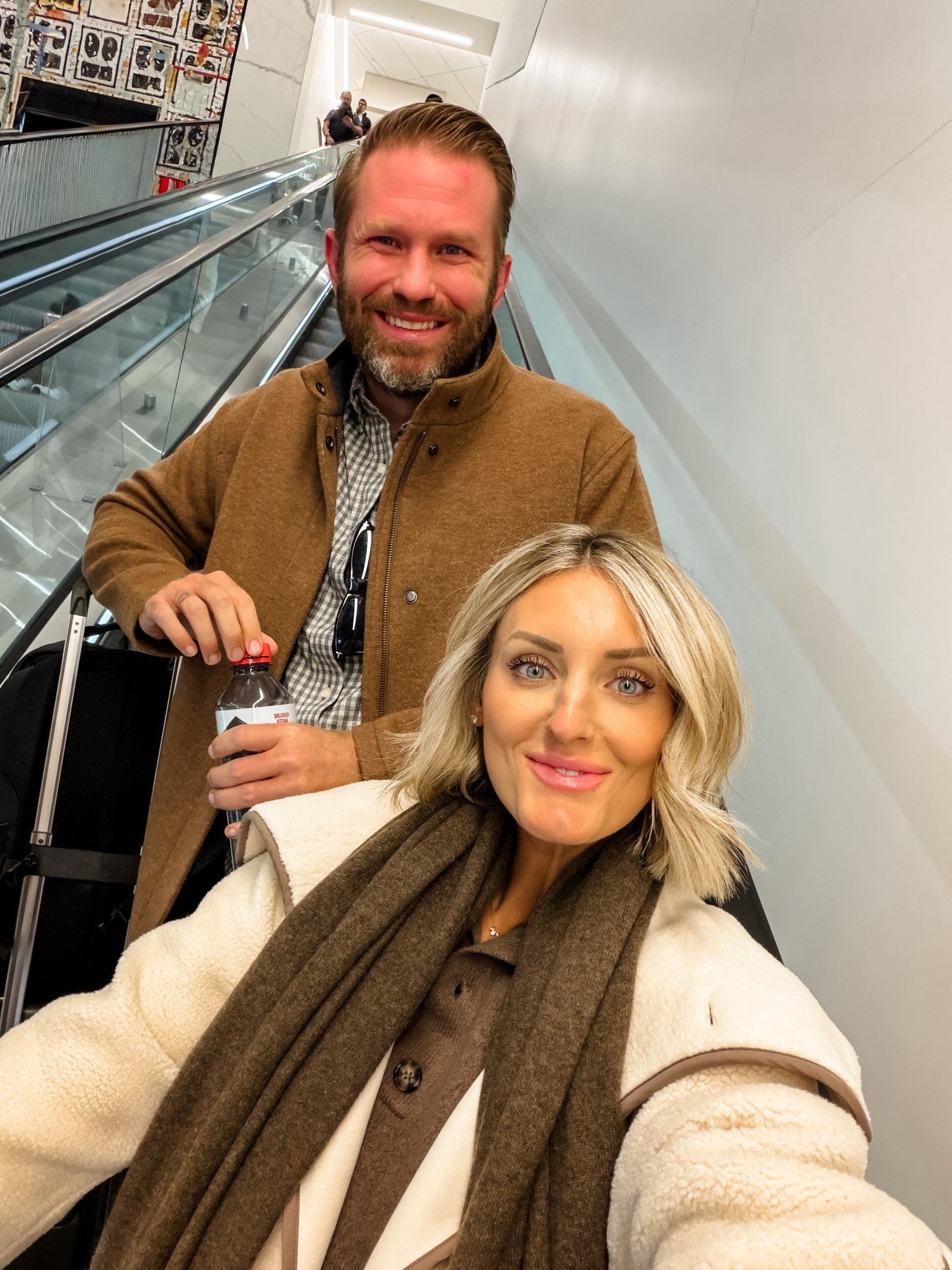 This was taken at the airport on the way to New York! I went for a brand meeting, and it was the best quick trip! Loved wearing this comfortable sweater dress on the way there! Wearing XS in jacket & S in dress!

Loverly Grey, travel outfit, airport, New York, men’s outfit, winter coat, men’s coat 

#LTKTravel #LTKStyleTip