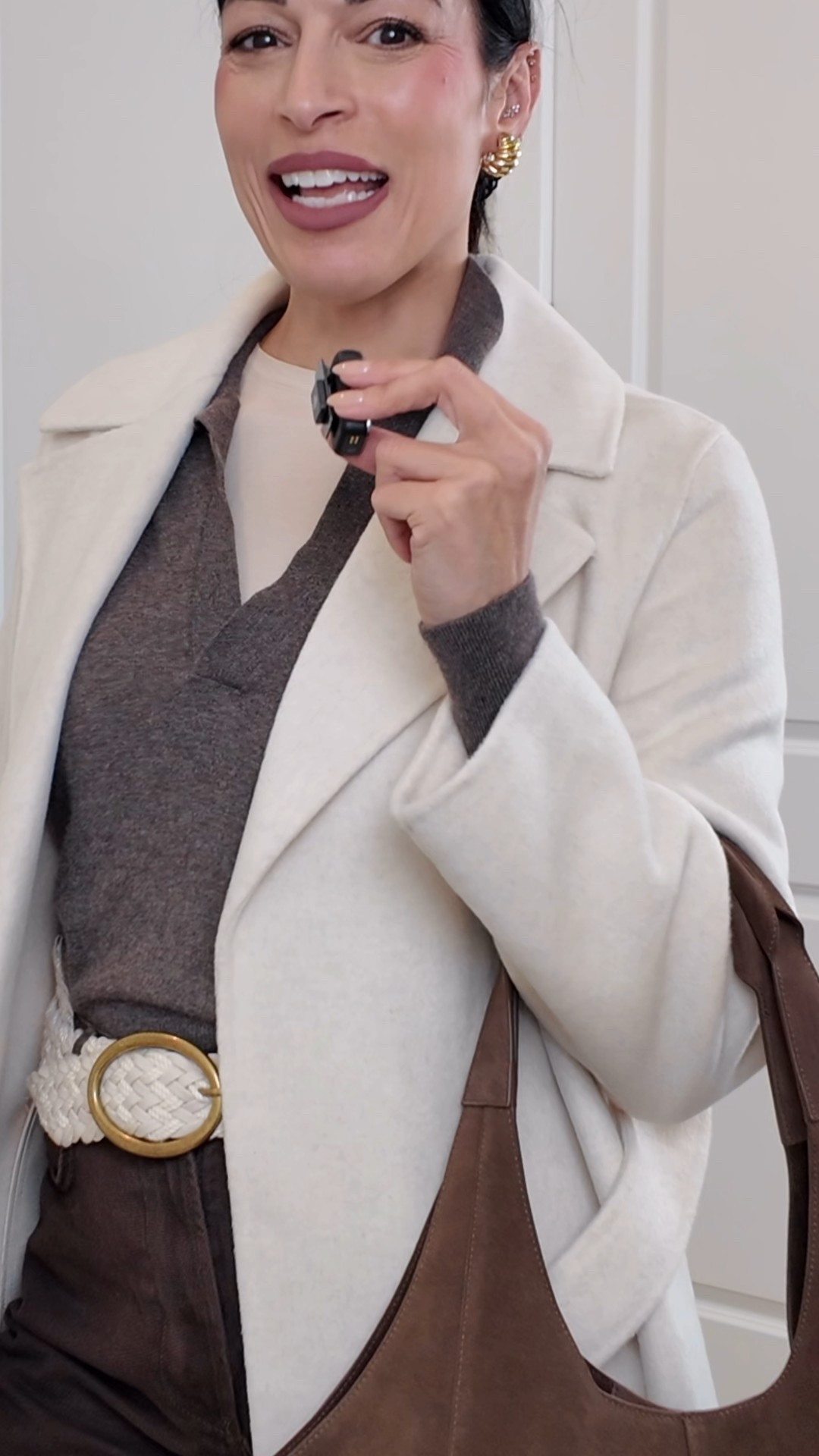 Winter outfit polo knit, layered tee, wide leg jeans, chunky loafers, and a suede bag. I love a belted coat, so chic! 

#LTKSeasonal #LTKootd #LTKOver40