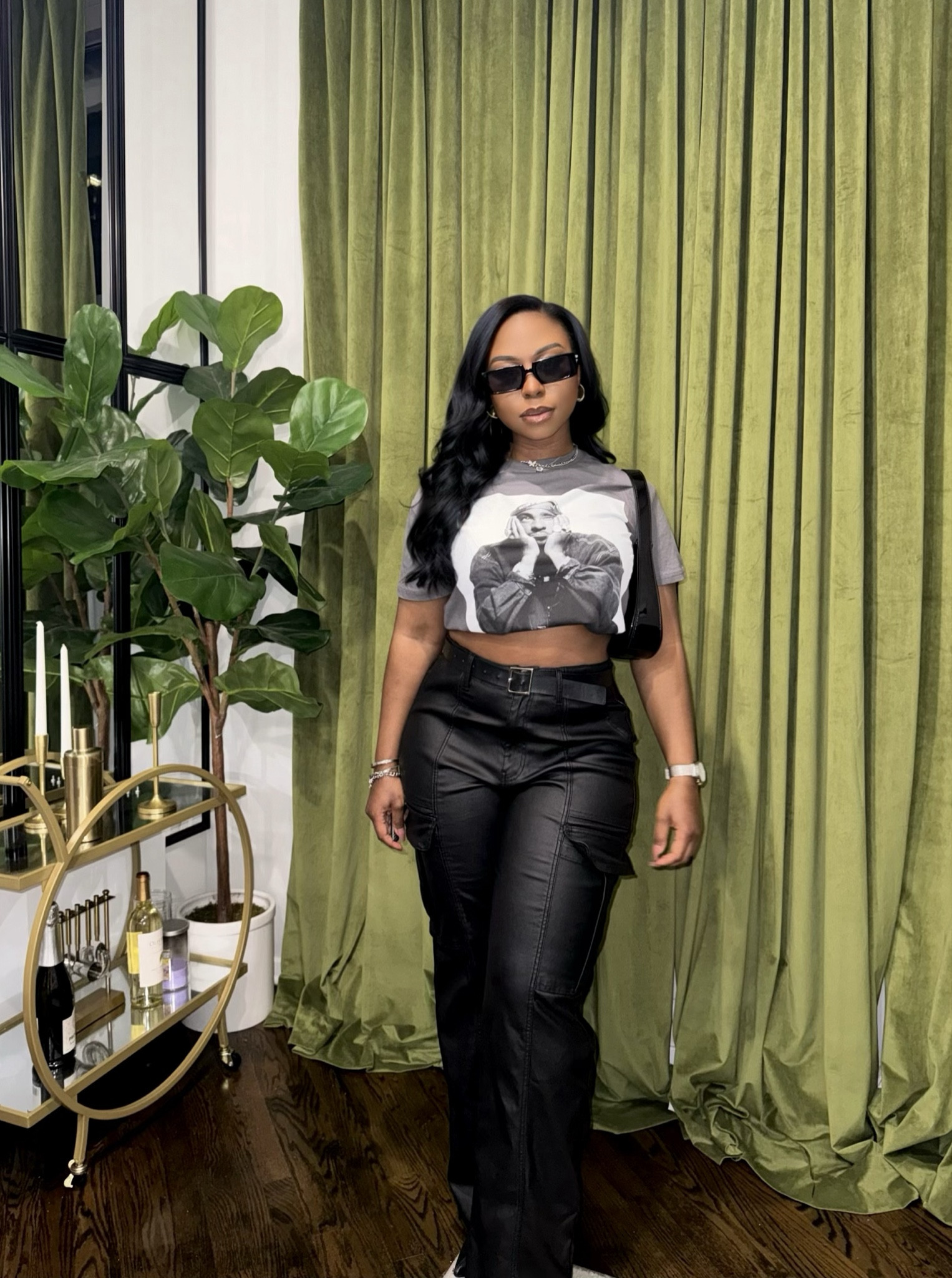 I love dressing up a graphic tee and styling it as a crop top by simply tucking the tee into my bra. Pair this Tupac tee with cargos, heels or sneakers for a laid-back yet edgy vibe. The perfect look for a night out or a concert 🖤 

5’3 | 160 lbs | Medium Top | Large Cargos

#targetfinds #affordablestyle #fashionblogger #styleblogger #LTKHome 

#LTKstyletip #LTKfindsunder50 #LTKparties