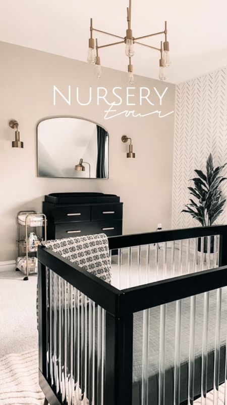 Modern boy nursery in colors cream / beige, green and black. Using black and acrylic delta children crib , black and gold accent furniture and accessories. Gold chandelier, gold sconces and velvet green  extra long 109 inches curtains from AMAZON linked. Affordable but elevated nursery decor. 

#LTKhome #LTKkids #LTKbump