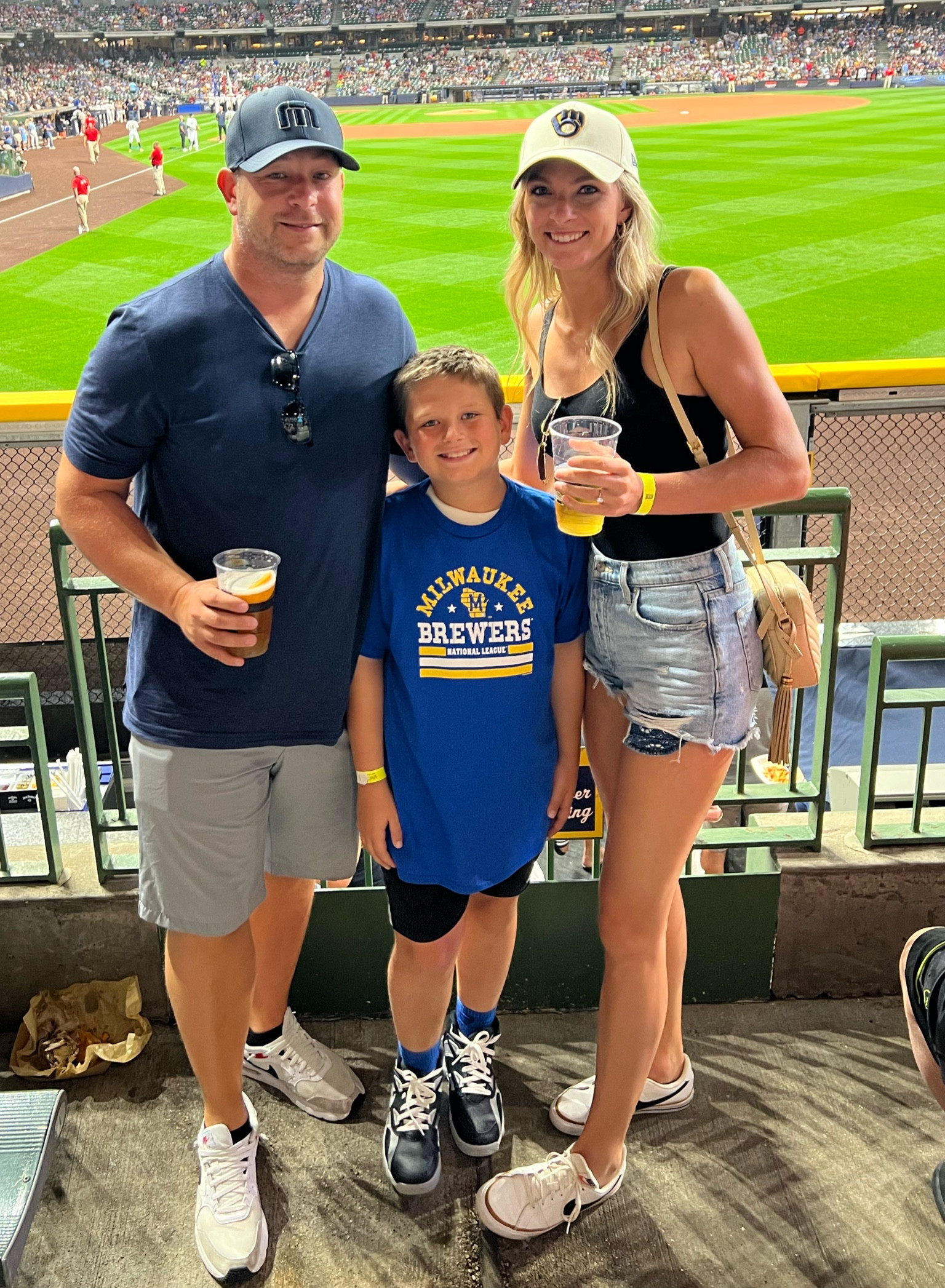 We love visiting ball parks! ⚾️ Jean shorts and a tank top with tennis shoes is my go to outfit because it’s comfy, easy, and cute! 
•I am 5’10” wearing a size small and size 26 in shorts 
•Brandon is wearing an XL but L now fits him much better (sized down since he’s been shedding lbs!!) 
•My YSL Crossbody is the color “dark beige”


#LTKmens #LTKfindsunder100 #LTKsalealert