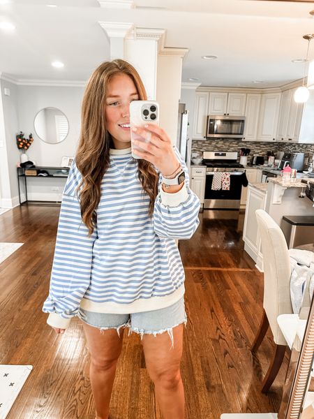 Wearing size XL. Runs more tts than oversized. Size up 1 if you want a more oversized fit. Comes in a bunch of colors. Very similar to a more expensive sweatshirt. 

Sweatshirt / spring outfit / summer outfit / stripes / striped sweater / coastal grandma / midsize 

#LTKfindsunder50 #LTKmidsize #LTKtravel
