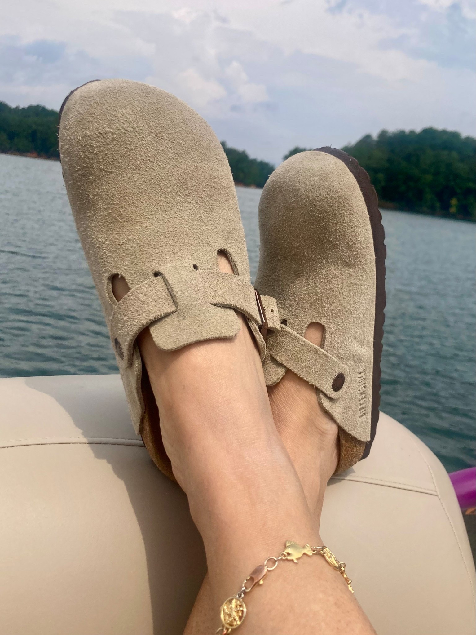 Kicking back in true lake day fashion — suede Birks, golden sunshine, and good vibes only! 🚤💦 With toes up and worries down, this is what peace looks like. #birkenstock #falloutfit

#LTKStyleTip #LTKShoeCrush