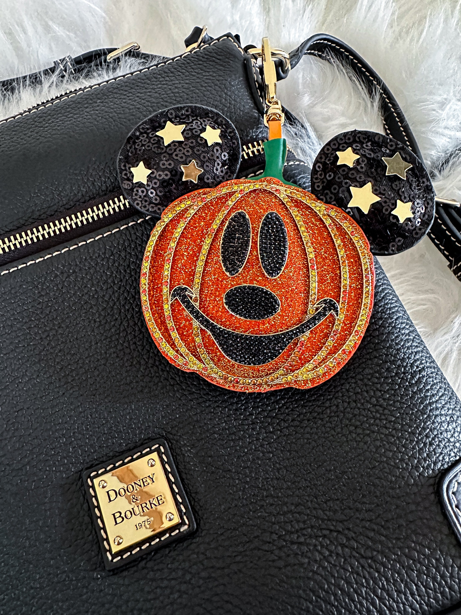 Mickey Pumpkin!! 🧡
Disney Halloween Style, black purse, bag charm

#LTKHalloween #LTKSeasonal #LTKItBag