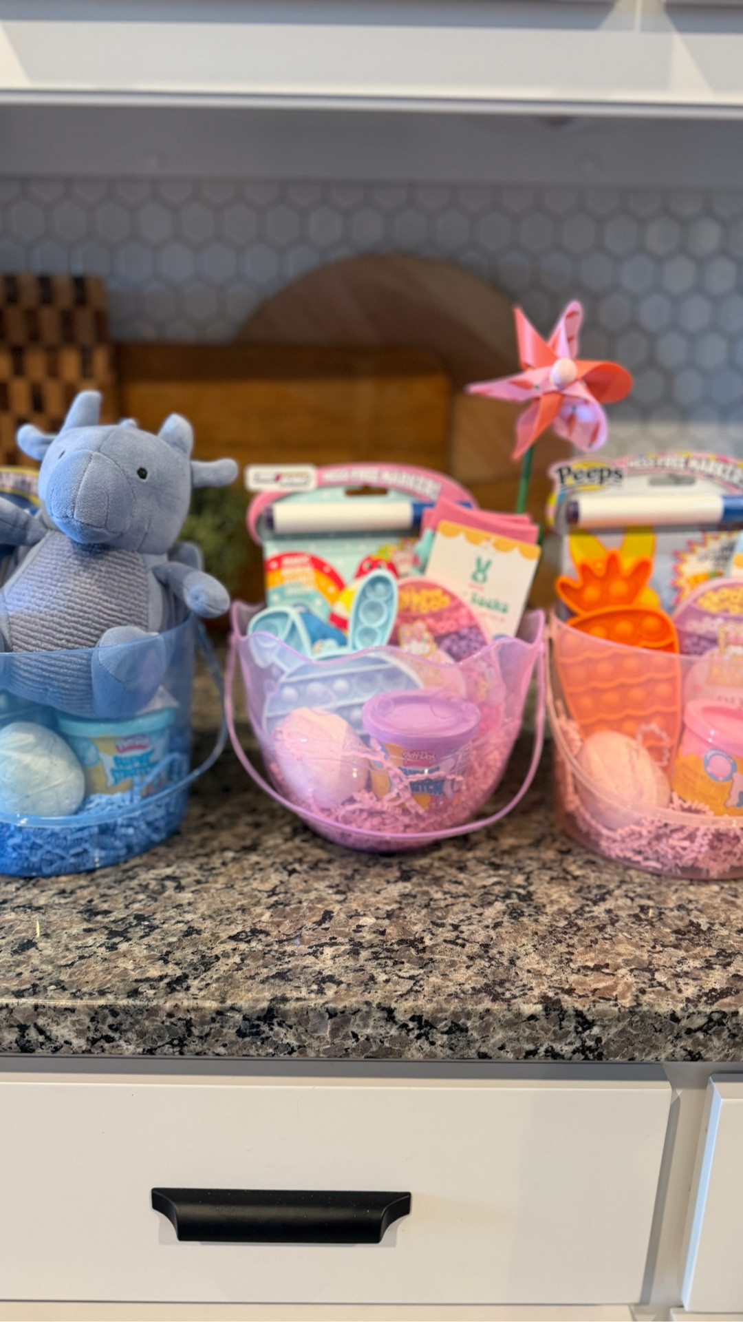 Target dollar spot for the win- kids Easter basket ideas with cute Easter buckets- add platoon, socks, cute crafts and trinkets from dollar stores . Jazz up with some Easter grass 

#LTKSeasonal #LTKSpringSale #LTKKids