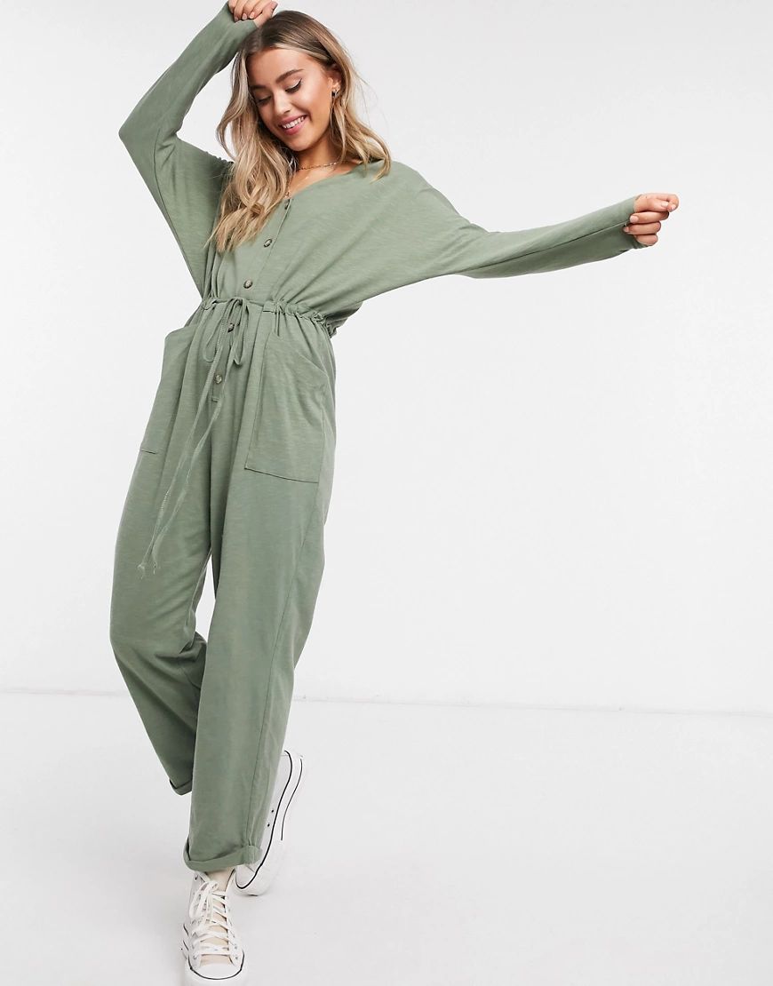 ASOS DESIGN lounge jersey button front long sleeve tie waist jumpsuit in washed khaki-Green | ASOS (Global)