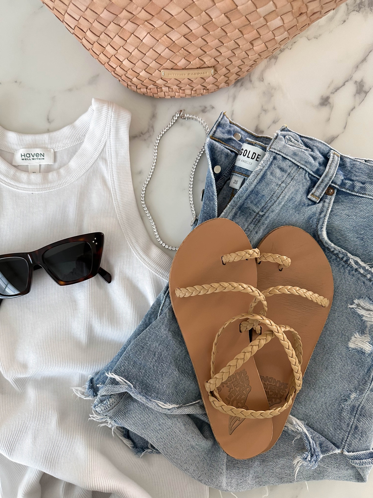 Simple summer outfits. Love this tank. So soft and comfy. 

Haven well within tank xs
AGOLDE Dee shorts 26. Sizes up 2 sizes. 
Ancient Greek sandals 35
Celine sunglasses. 
Loeffler Randall tote 



#LTKitbag #LTKunder100 #LTKshoecrush