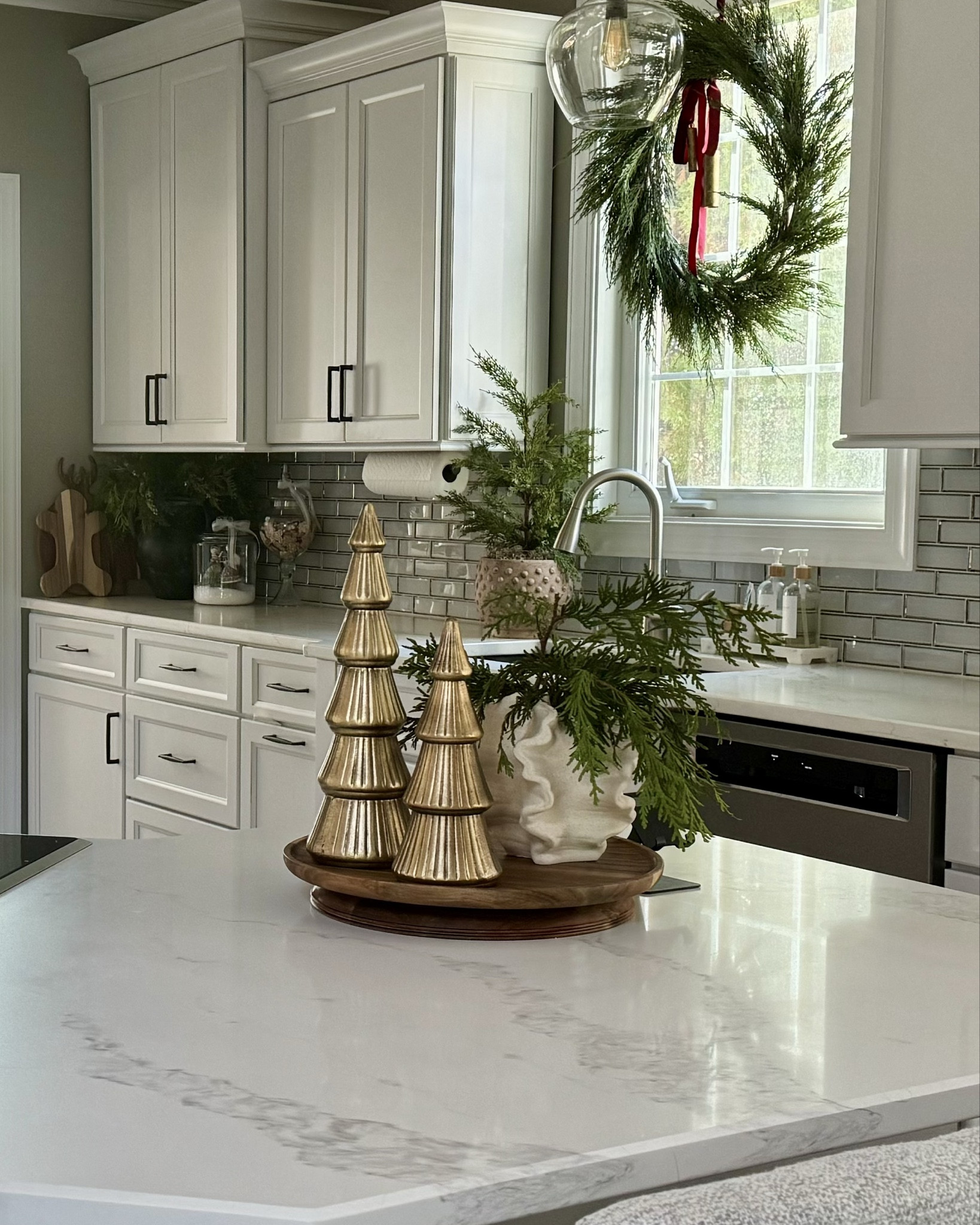 Amazon Prime Day Favorites in My Holdiay Home. 
Gold trees, ceramic vase, gold bells, ornament garland, pillow cover. 
#ltkamazon
#amazonholidaydecor
#amazonhome
#amazonchristmas


#LTKHome