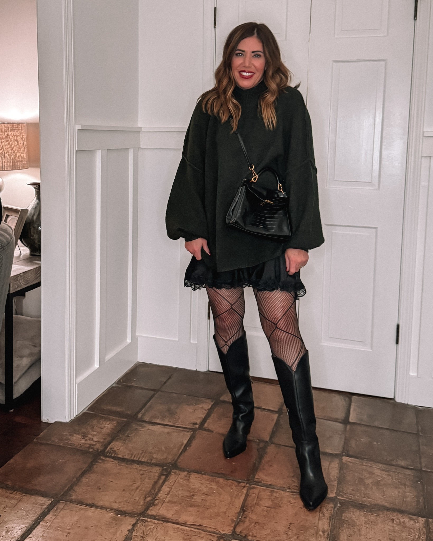 I love an all black outfit. Free People slip dress is a medium with an Amazon sweater layered over. My boots are no longer available but I linked more options #creatorfavorites2025

#LTKMidsize #LTKootd #LTKOver40