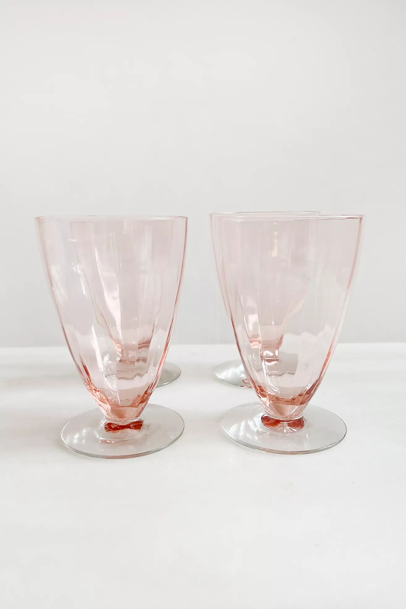 Old Flame Candle Co. Vintage 1950s Footed Pink Depression Glasses, Set of 4 | Anthropologie (US)