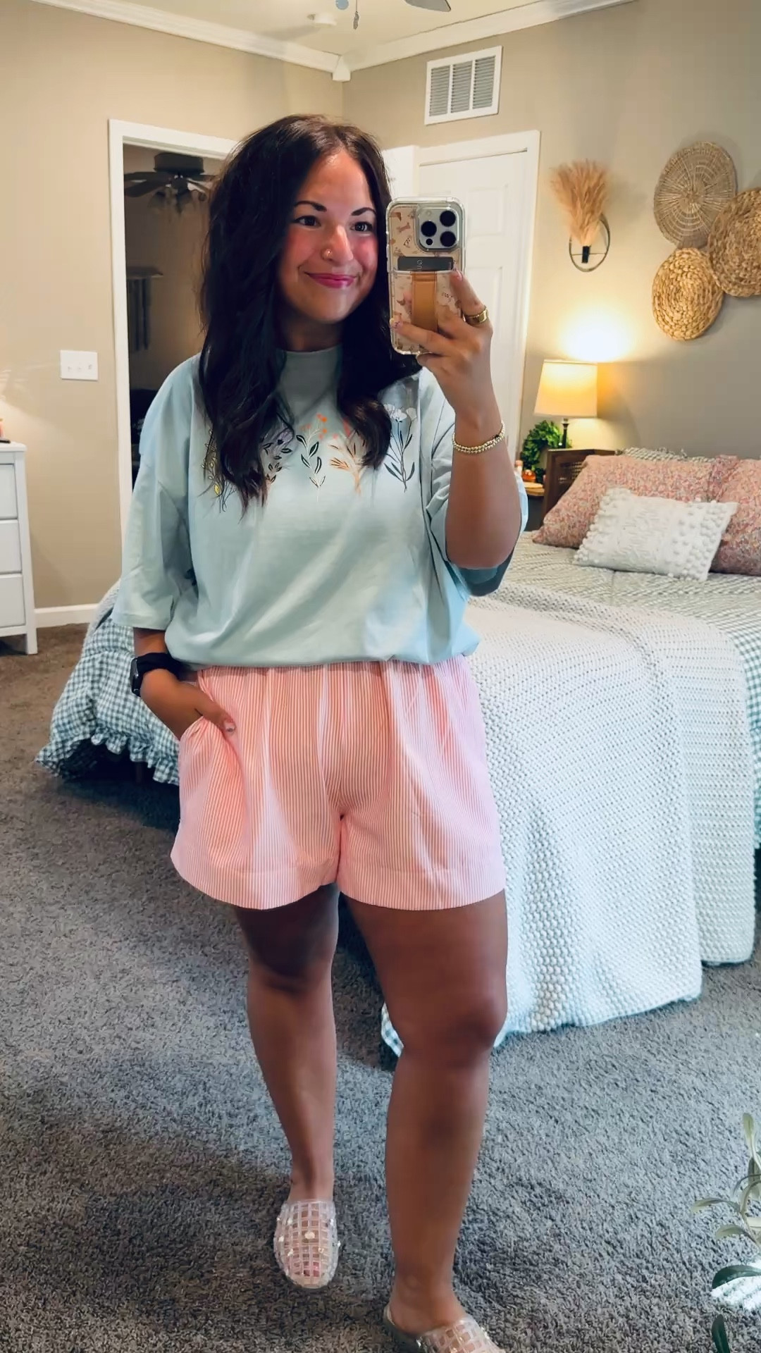 Trending for a reason 🤍 Graphic tees and striped shorts are the ultimate casual summer combo—laid-back, cute, and perfect for all your warm-weather plans ☀️

jelly flats: fit true to size // wearing a 5
shorts: fit true to size // wearing a large
tee: fits oversized // wearing a large 

 #LTKootd #LTKMidsize