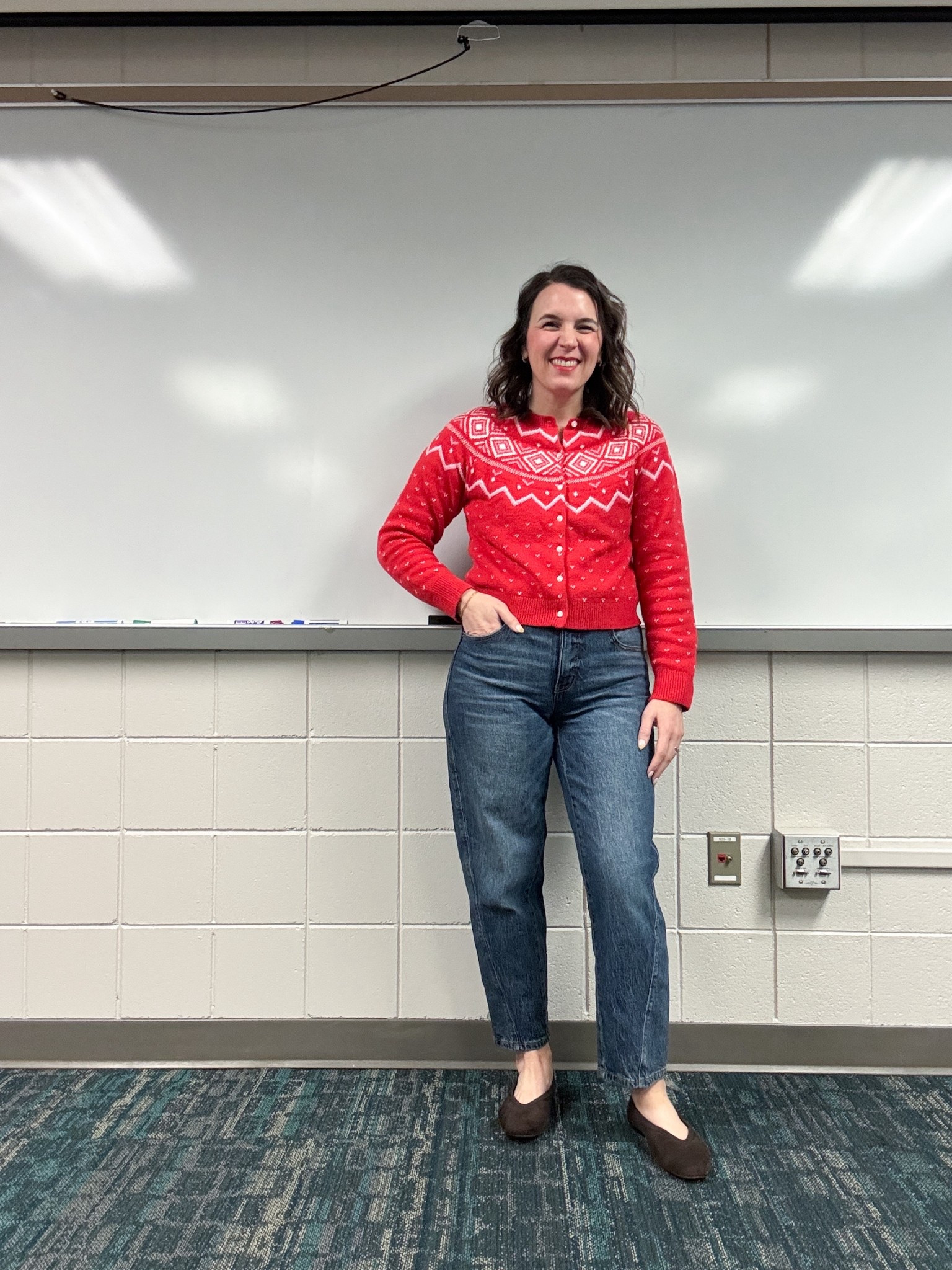 This red Fairisle sweater is great for the holidays, but will also make its way into the rest of winter. 

Also loving these slim barrel leg jeans 