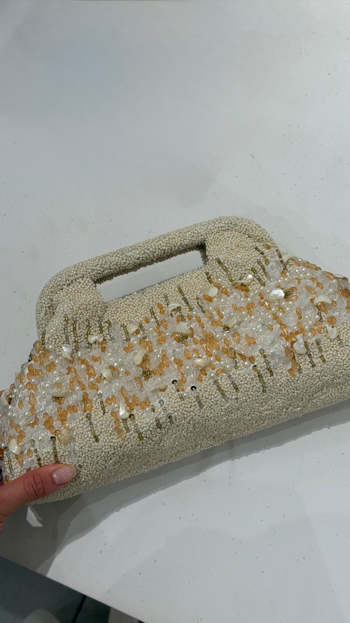 Beaded clutch that would be a vacation staple this spring and summer time!! 

#LTKSeasonal #LTKootd #LTKTravel