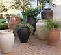 Sienna Fibre Stone Outdoor Planters | Pottery Barn CA