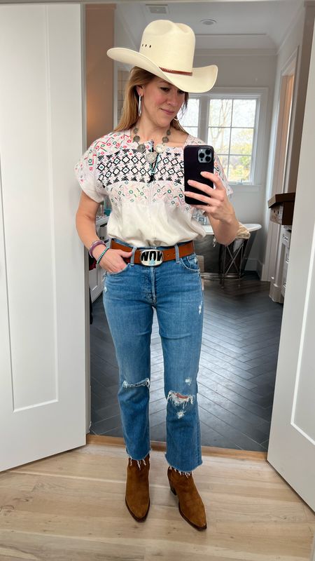 Western Fit #4. Trying to stay cool with 80 degree weather so denim with holes and booties instead of tall boots. 

#LTKSeasonal #LTKstyletip #LTKtravel