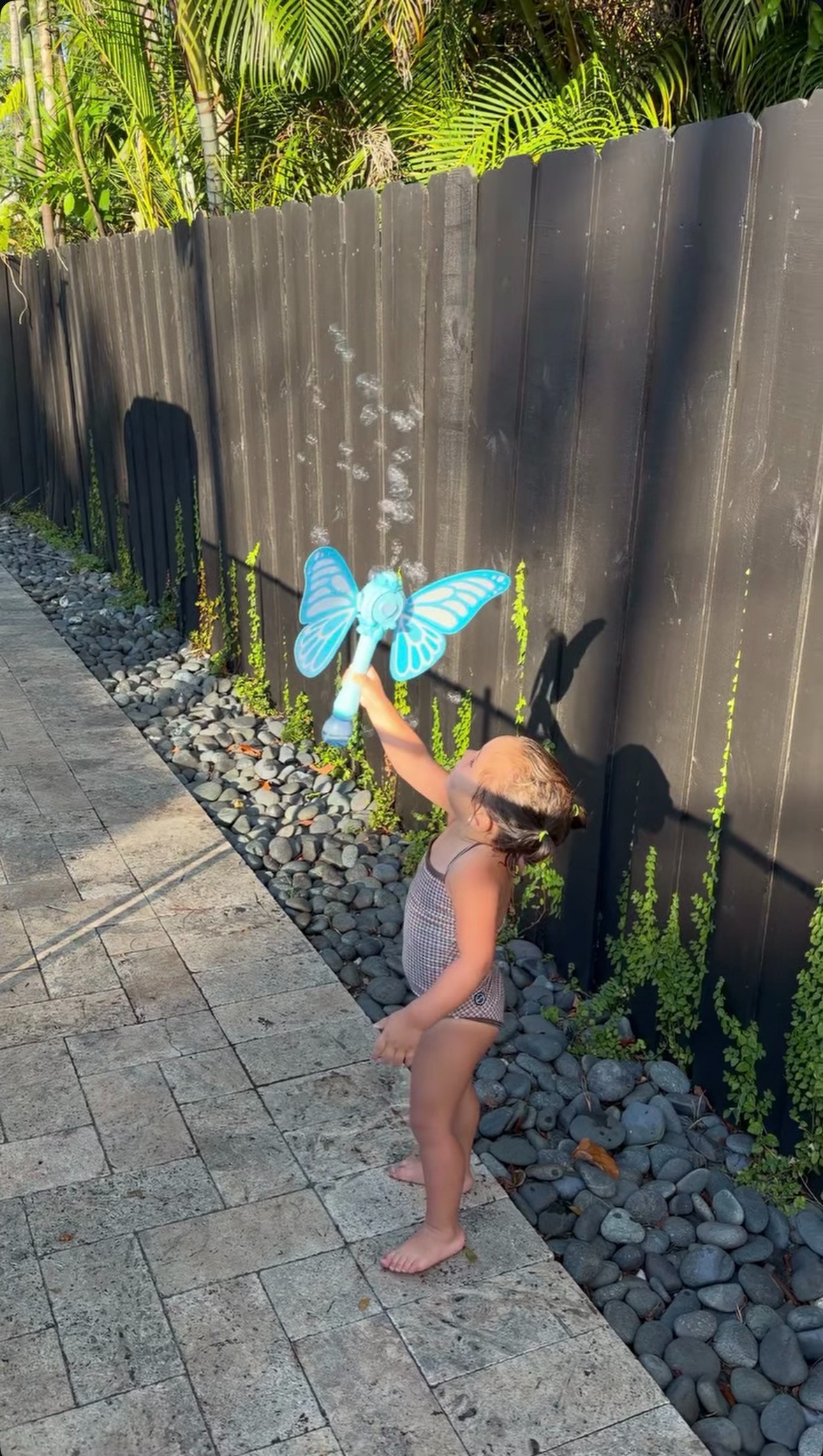Making magic in the backyard with bubbles & sunshine 🫧🦋 

 #LTKSeasonal #LTKSwim #LTKKids