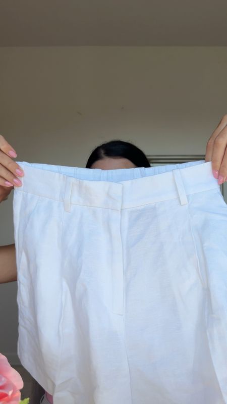 White linen blend shorts 
stretchy waist and a bit see through.

#LTKtravel #LTKsummer #LTKstyletip