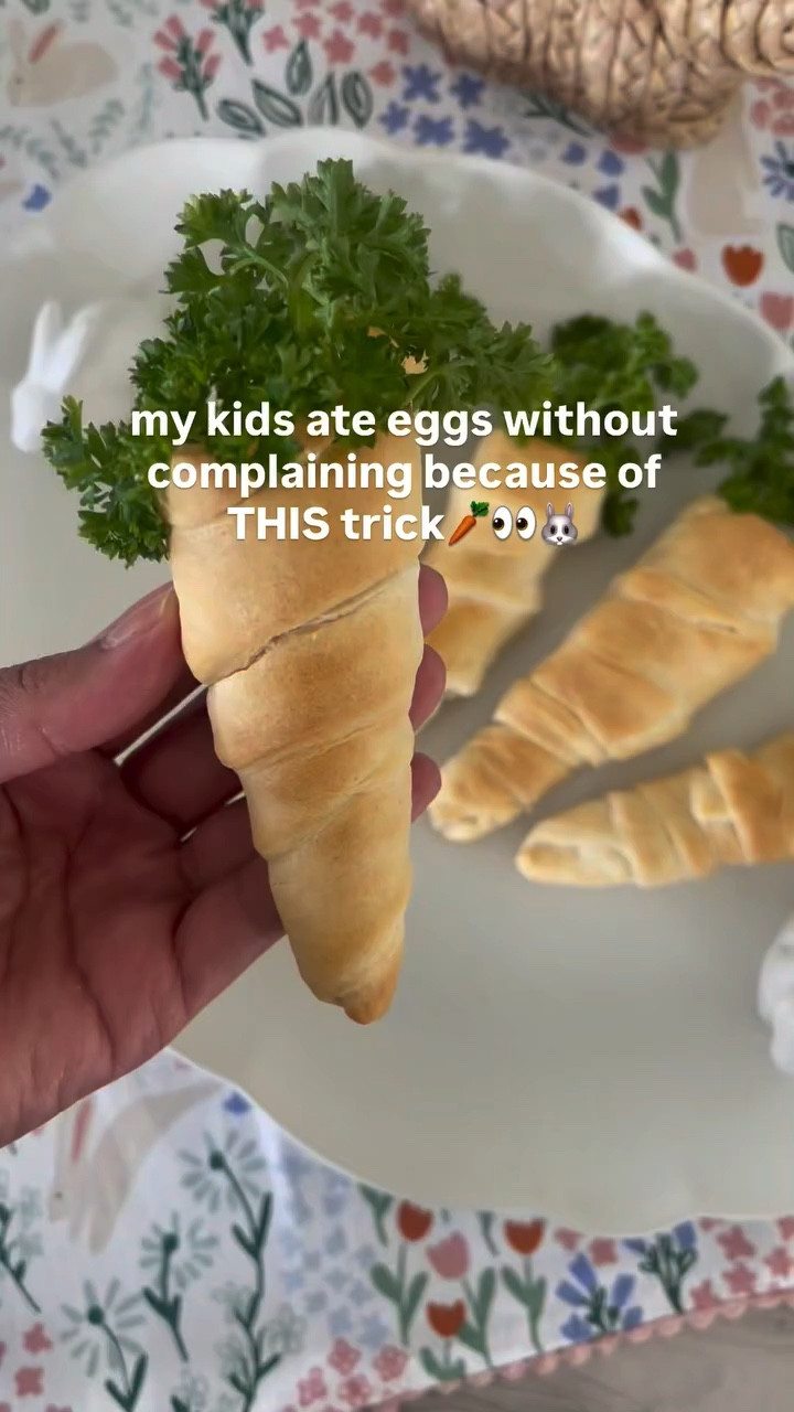 I swear presentation is everything because tell me why my kids devoured eggs when they looked like carrots 🥕😂

RECIPE:
1 package crescent roll dough
Eggs
2 tsp garlic
1 cup fresh spinach, chopped
1 tbsp fresh chives, minced
4 sprigs fresh dill
12 sprigs parsley
1/4 tsp salt
1/4 tsp pepper
Roll foil into carrot shaped cones. Cut crescent dough into 12 strips (long ways).
Wrap strips around cones loosely. (Don't wrap too tight or you'll never get them off). Bake on 400* for 9 minutes. Remove the foil cones. Make scrambled eggs, your way. Spoon them into cones and top with parsley sprigs.

This might be the easiest Easter brunch win ever—minimal effort, maximum excitement 🐣✨

Save this for Easter morning (or honestly any picky eater phase 🙃)

#easterbrunch #easterfoodideas #kidfriendlymeals #easter #easterfood

#LTKKids #LTKSeasonal #LTKfoodie