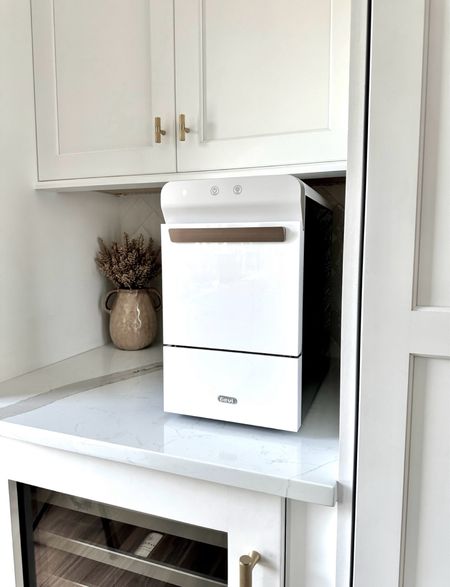 This ice maker creates the best nugget ice that everyone loves and is stylish enough to keep on your countertop. Perfect for parties and summer gatherings!


#LTKHome #LTKSaleAlert #LTKParties