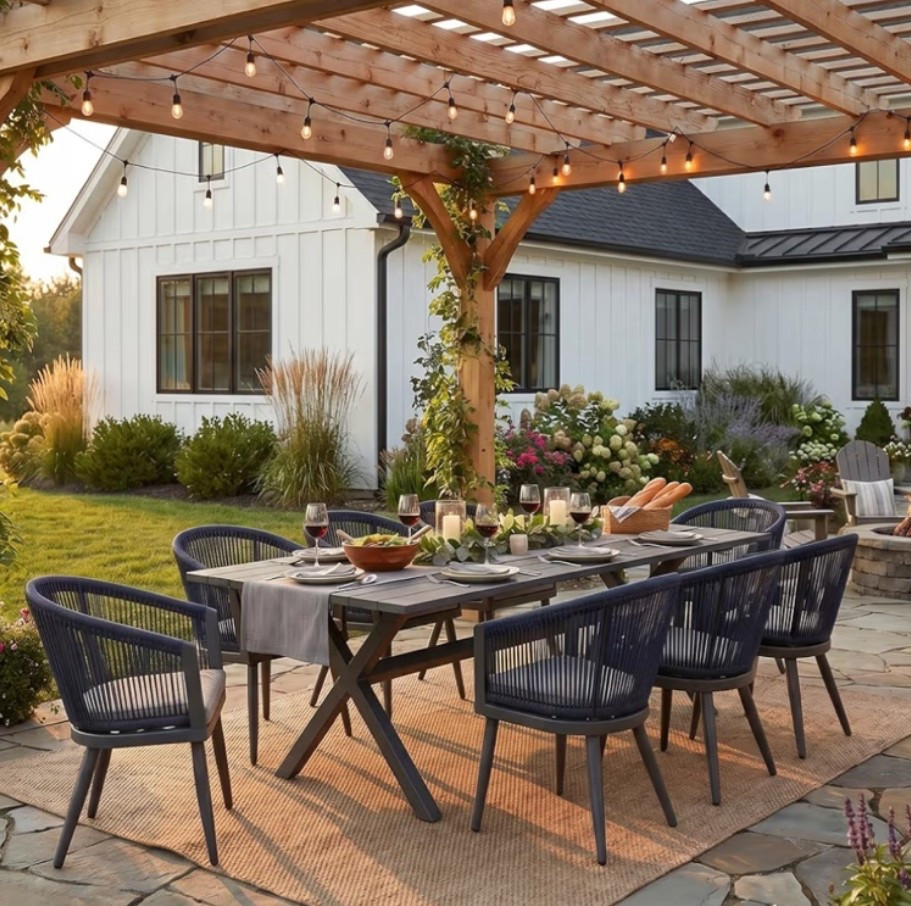 Large outdoor dining set with that elevated modern farmhouse patio feel that makes summer hosting look straight out of a designer backyard. 🪿 Perfect for patio dinners, backyard BBQs, pergola setups, poolside gatherings, outdoor brunch, family dinners, or slow golden hour evenings when you want seating that feels both cozy and expensive. The rope weave chairs, grey and navy tones, aluminum table, and cushions give it that clean resort-style look while still feeling warm and inviting. 

Add this set if your patio needs a statement dining space for summer nights, hosting, and outdoor living. ☀️🌿🍅🍷

#LTKOver40 #LTKHome #LTKfoodie