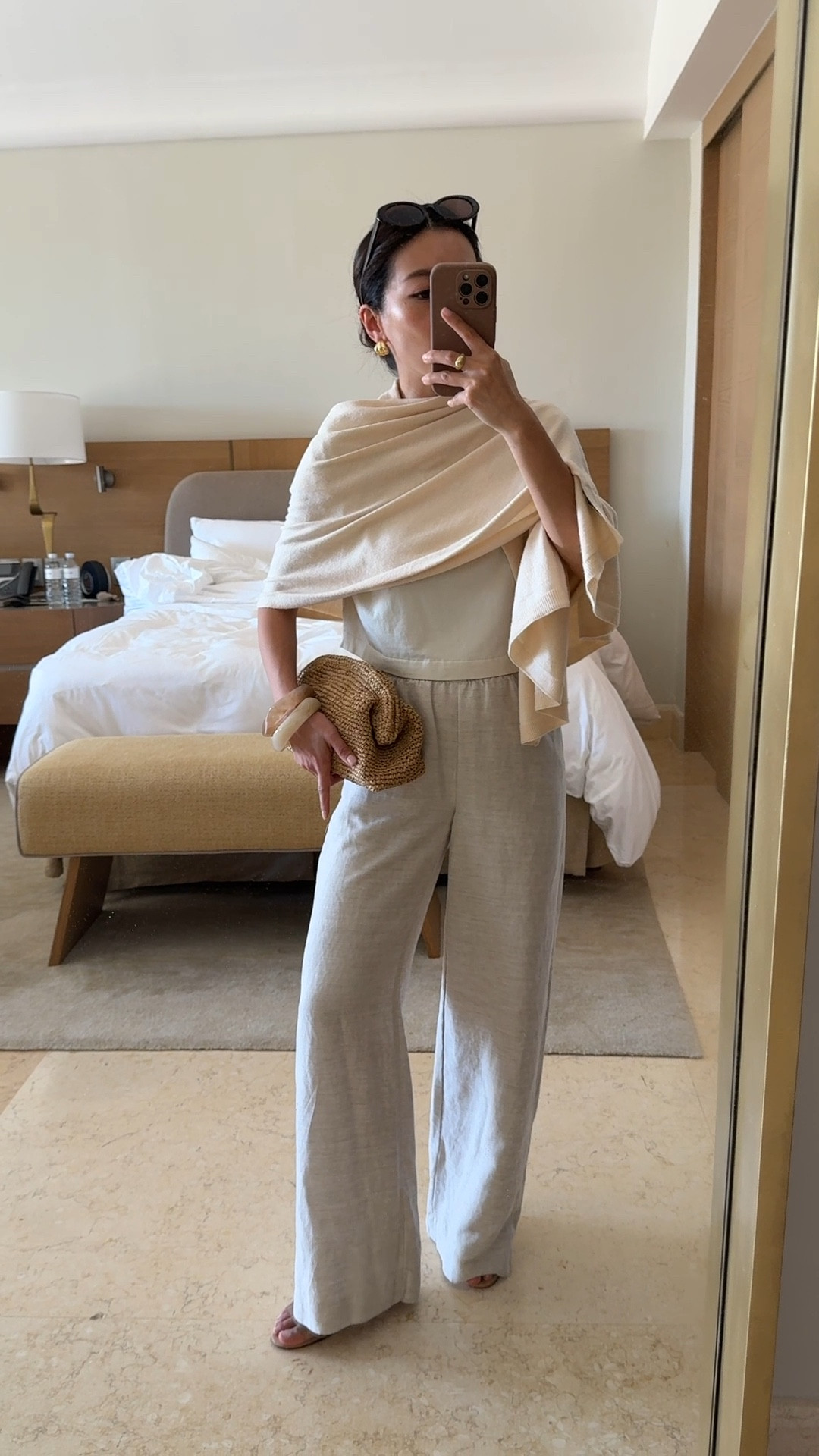 Linen blend pants that wrinkle less 

• Aritzia cruise linen pants xxs regular (length shrunk in washer dryer) , has a stretchy pull on waist

 Is a little long on me, the Short length I can wear with flats after washing and drying shrinkage 

• Amazon convertible poncho sweater wrap, has button on back to turn from poncho to regular scarf wrap.

• lululemon cropped cotton tee xxxs, but I could’ve done xxs. Soft but has some boxy structure and the length is great for still showing the waistline 

• Schutz clear sandals 5.5

• J.crew handknotted clutch

• Madewell oval sunglasses

Petite friendly vacation outfit, family vacation, resort look, easy mom outfit

#LTKmomlife #LTKPetite #LTKTravel